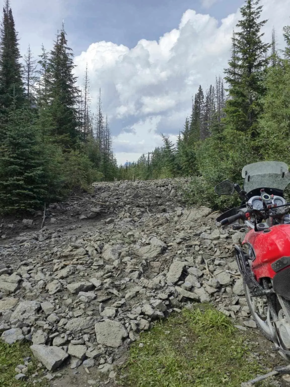 This new rock &amp; mud slide is located on Quinn Creek, approx 25km N of the junction with the Bull river. 
49.93664, -115.29736

Thank you to some adv riders who informed us. It seems like some of the bigger storms this year have resulted in more s
