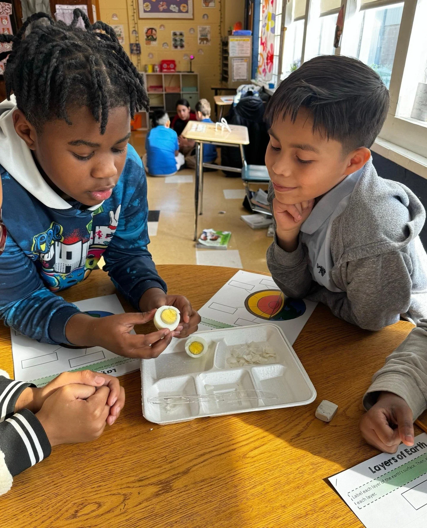 Cracking into science! 🥚 Our 4th graders dissected eggs to explore and compare the layers of the Earth.