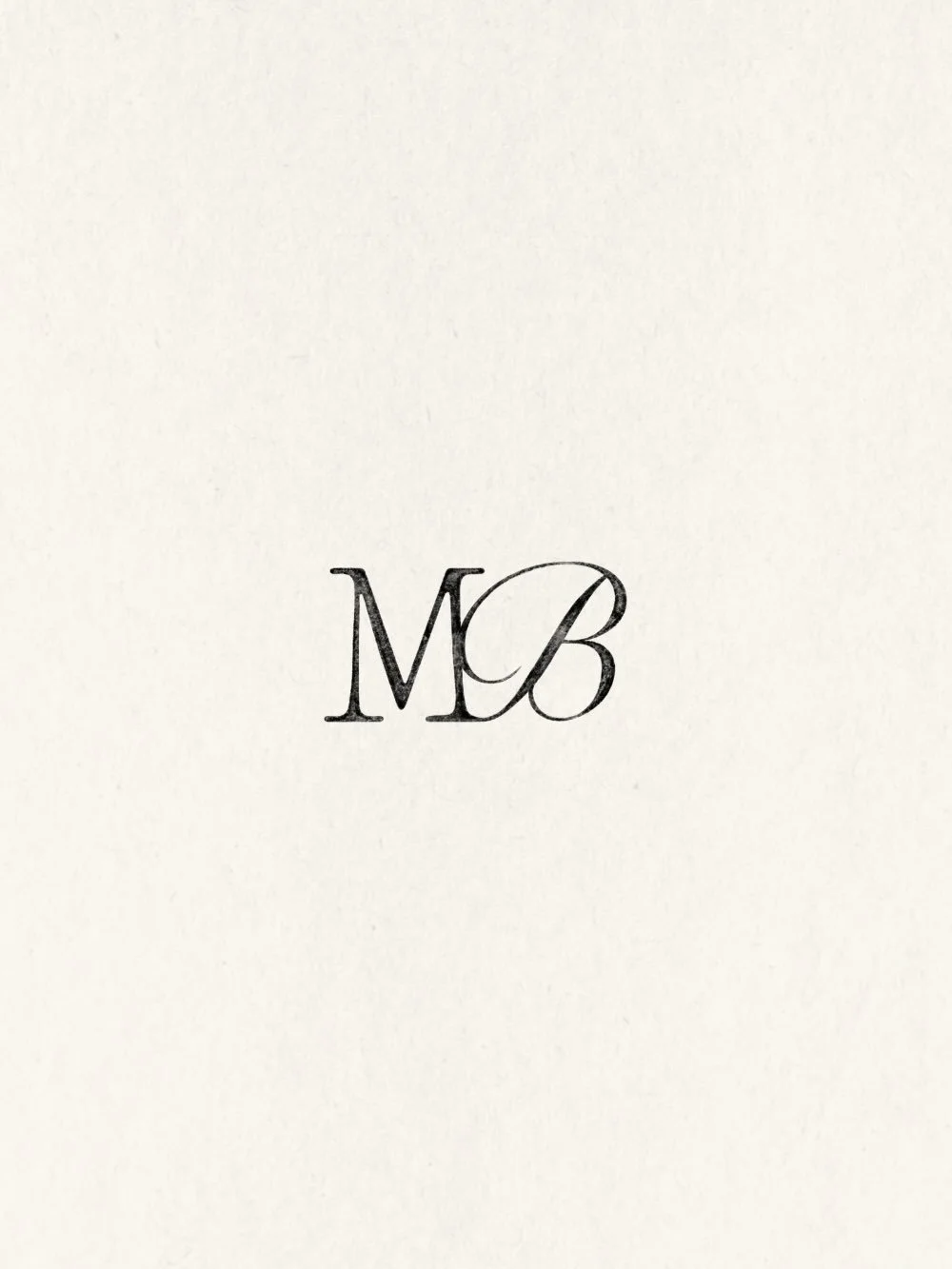 A classic little monogram for Megan and Brandon, designed to carry through their wedding stationery, website and beyond.