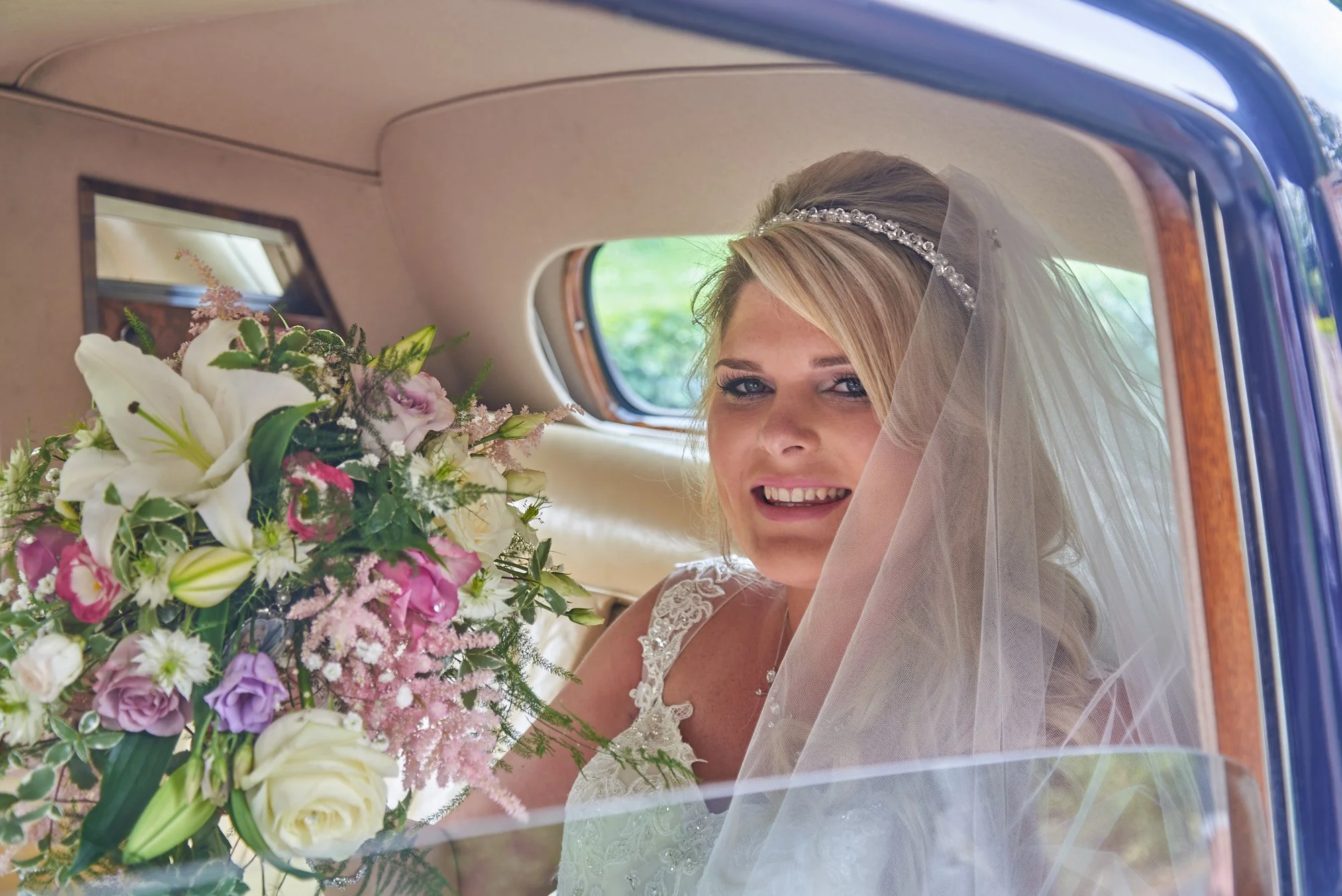 Bride in Wedding Car