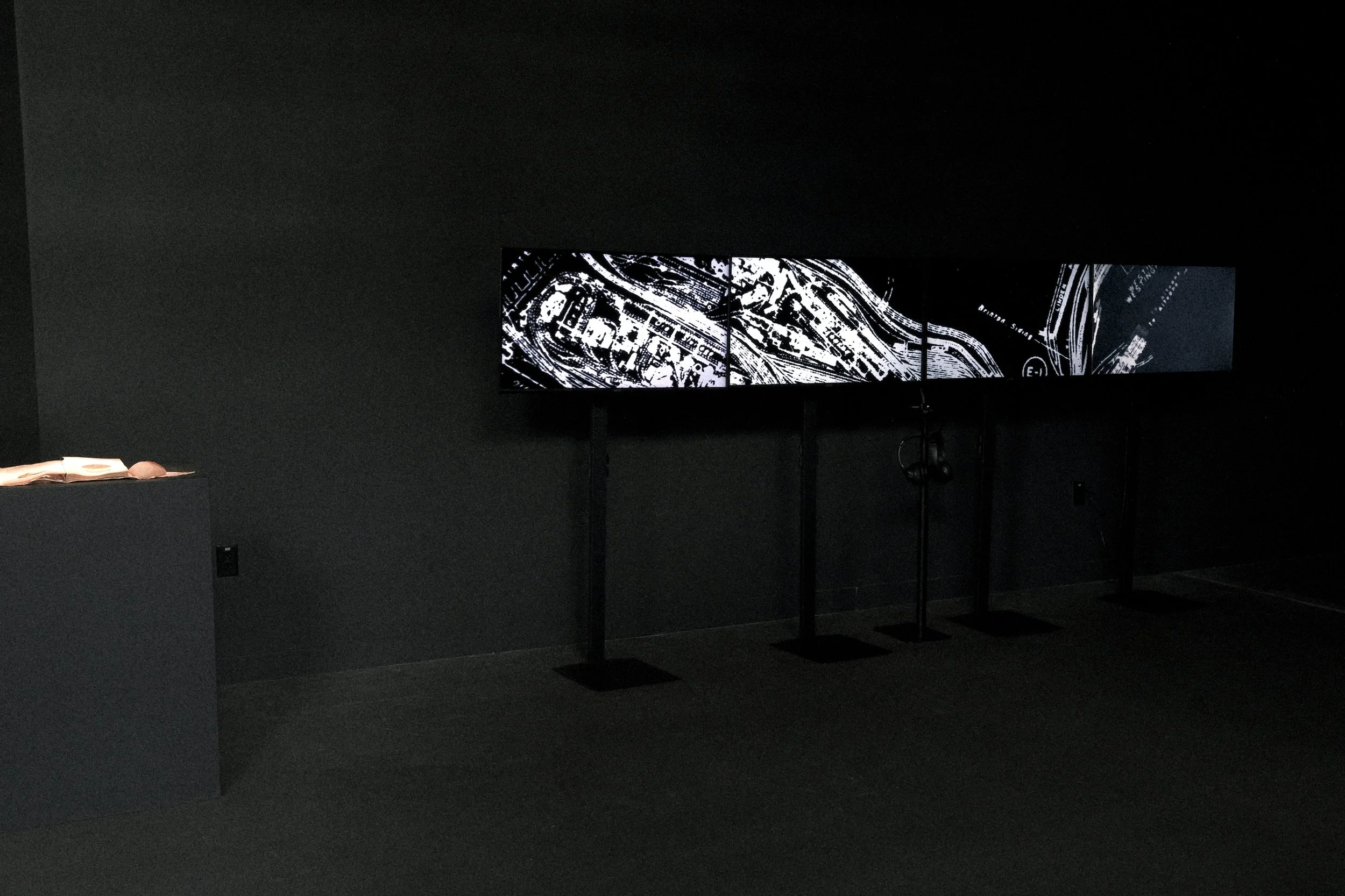 rebecca shapass, "slag study (for this third century)," 2024, LCD monitors, stop-motion animation, still photographs, + ai generated video, 1920 x 7680, TRT: 00:05:10.