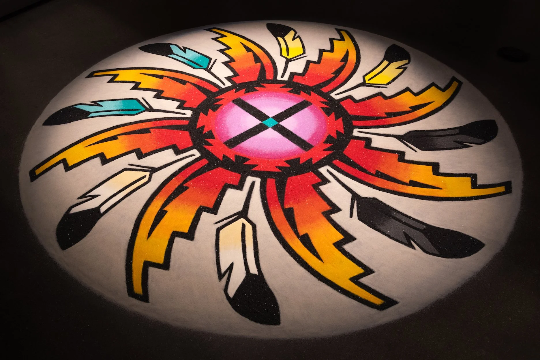 JayCee Beyale, "Sháńdíín (Sun)", 2025, Colored sand, 8′ feet diameter.