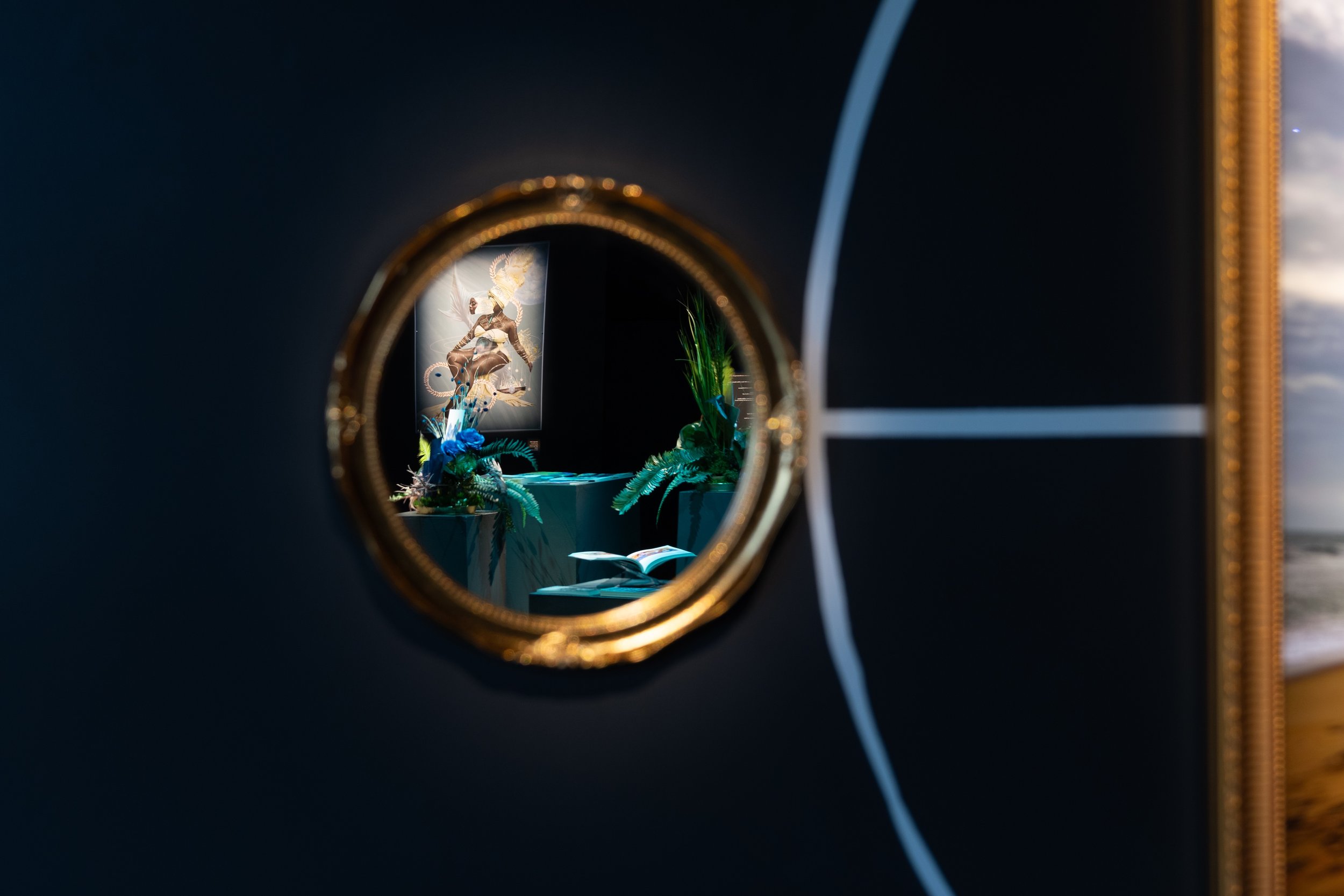 Detail image of Ehime Ora's "The Return of Us," 2024, Digital Photography in Gold Frame, Mirrors and Cosmogram, 50 x 60 inches. Photo by Raymundo Muñoz.