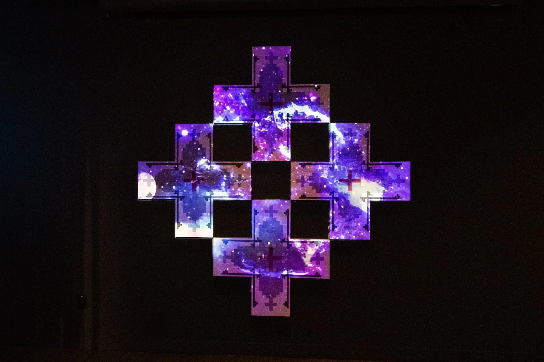 JayCee Beyale, "Nishłį (I am)," 2025, Wood Panels with wood stain and acrylic ink, visual projection, Dimensions variable.