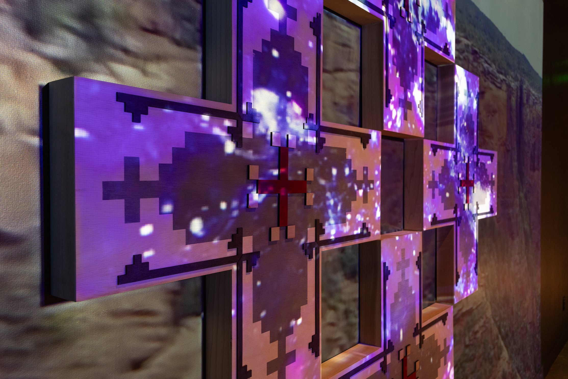 JayCee Beyale, "Nishłį (I am)," detail 2025, Wood Panels with wood stain and acrylic ink, visual projection, Dimensions variable.