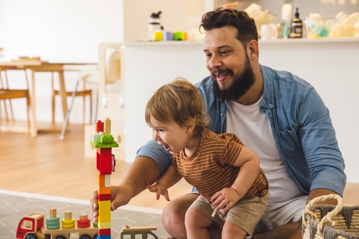 Father and son building a tower