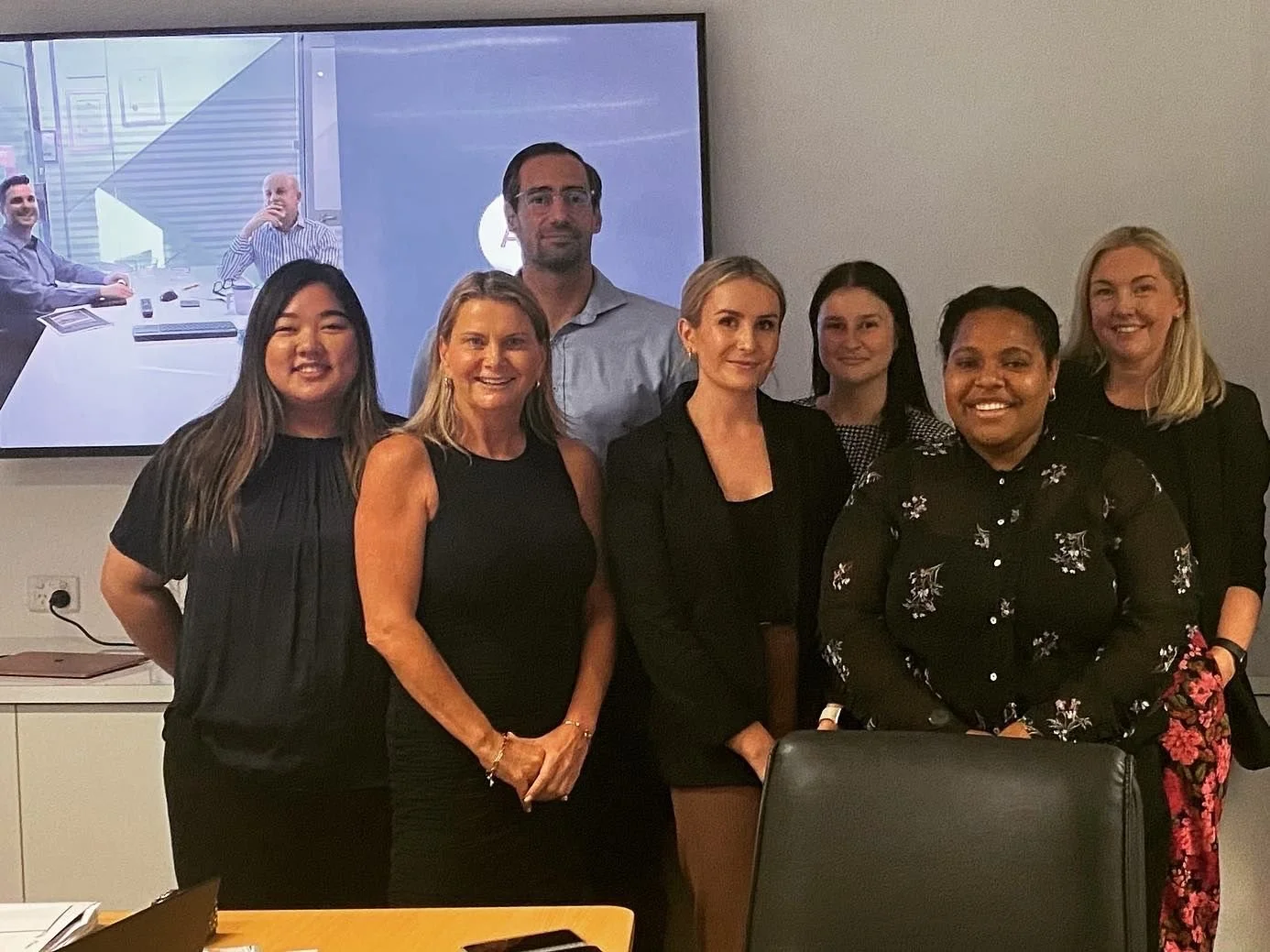 Legal professionals in leadership training session led by Midja Fisher, enhancing skills for law firm success