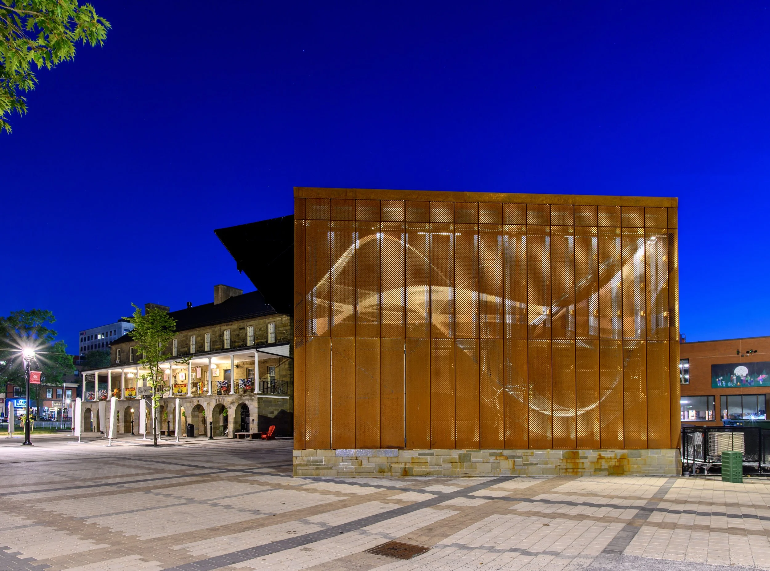 The Garrison Stage designed by The Acre architects, featuring an Ironbound custom weathering steel envelope