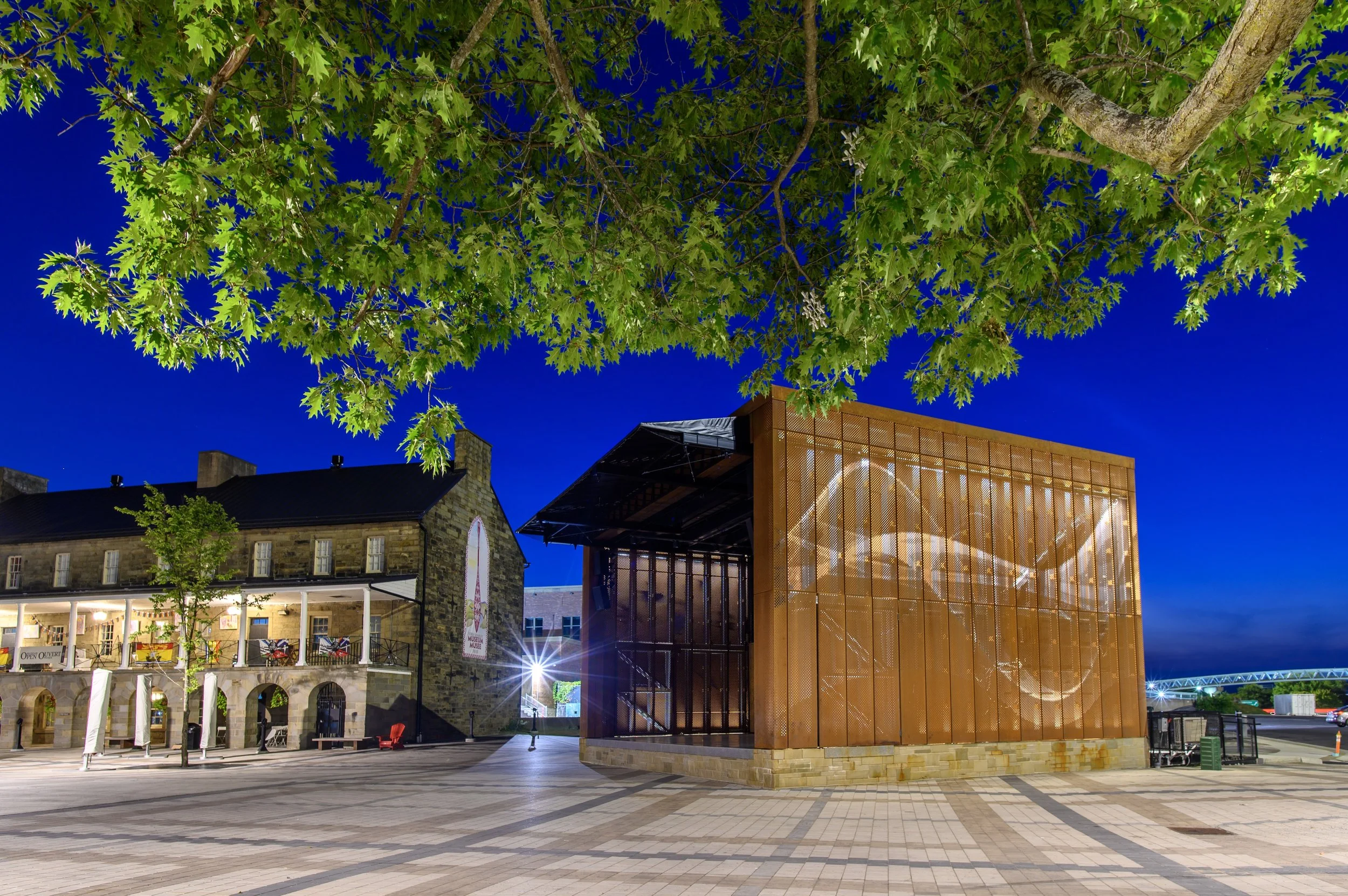 The Garrison Stage designed by The Acre architects, featuring an Ironbound custom weathering steel envelope