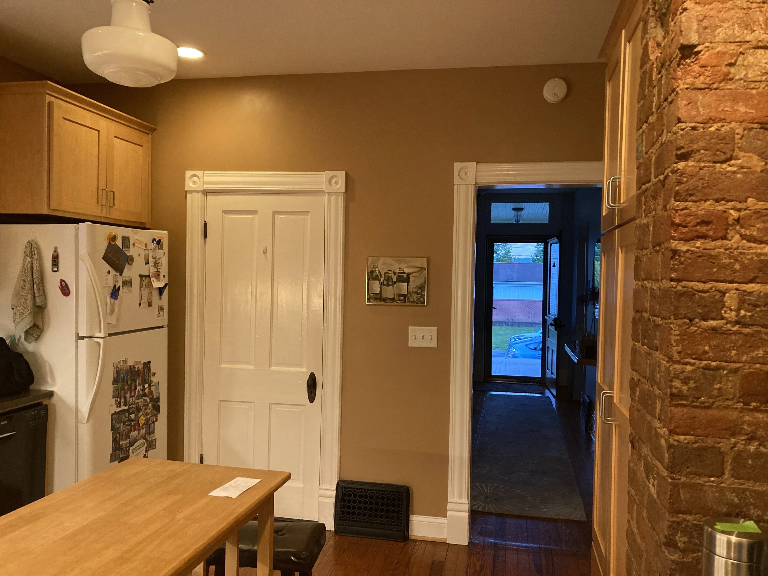 Kitchen before looking into hallway to front door