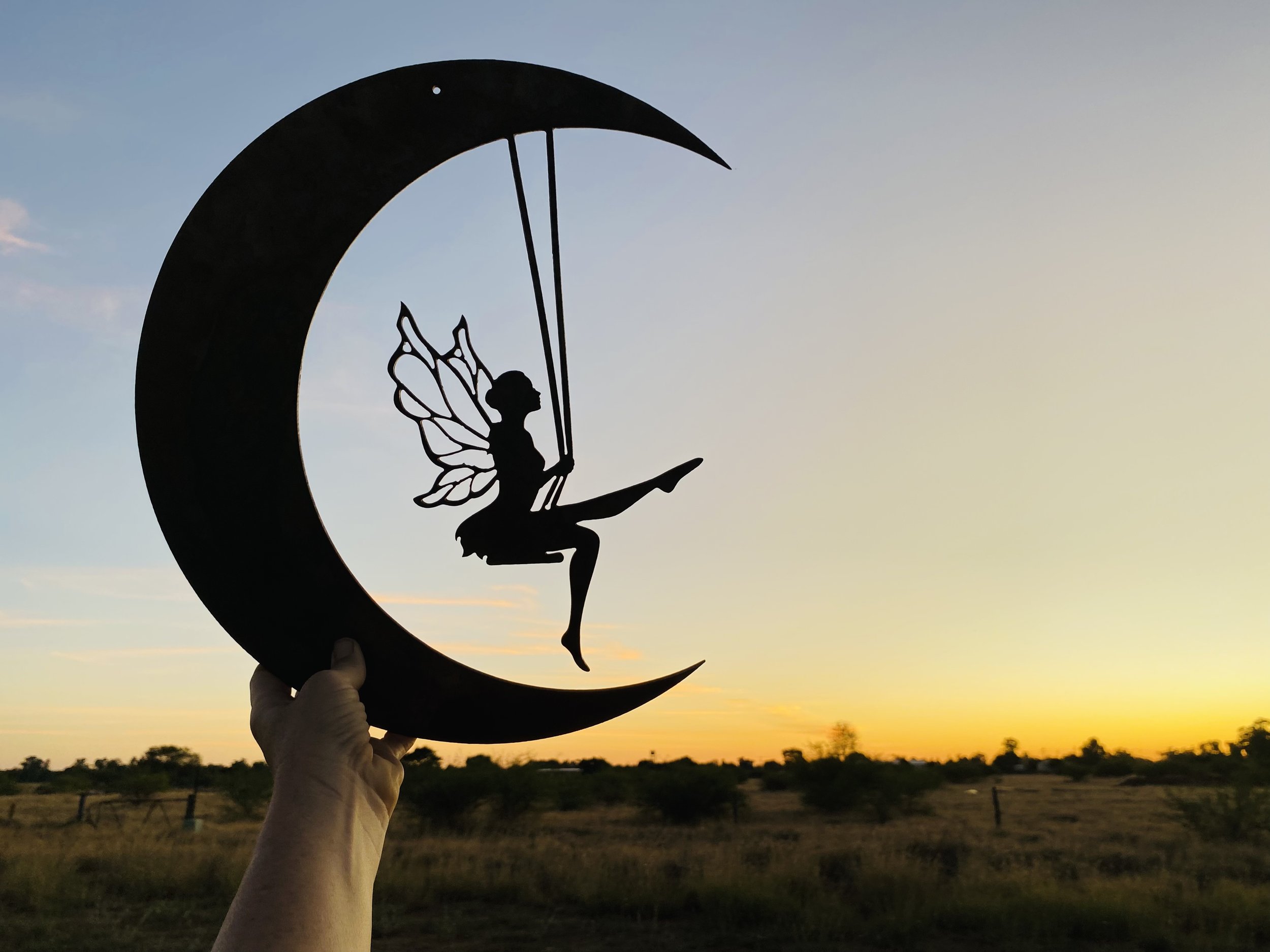 Fairy hanging with the moon