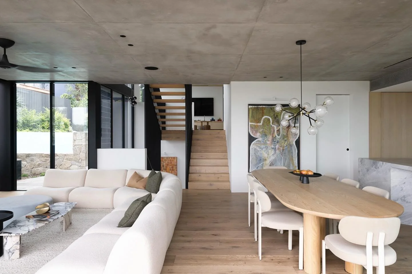 The open plan kitchen dining living room at our Seaforth 02 project. Meticulous craftsmanship by @mink_building_group Interior Styling: @lxjcreativestudio Photography @simonwhitbreadphoto Lighting design @wildly_illuminating #watershedarchitects