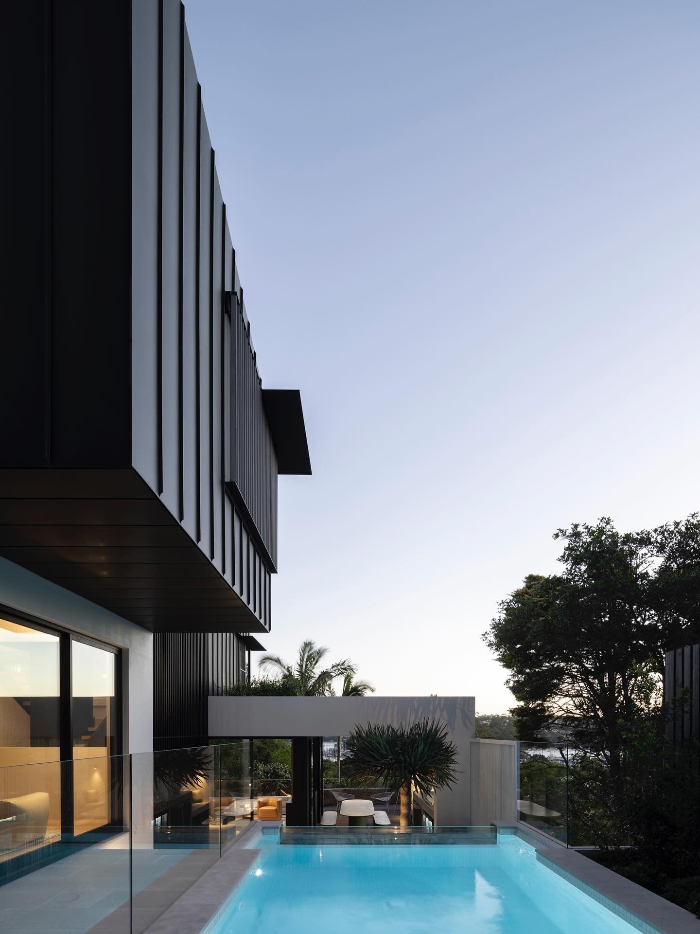 Some dusk shots at our Seaforth 02 project showing the pool area to its best advantage. A viewing window helps connect the pool to the lower living area. Builder @mink_building_group Photos @simonwhitbreadphoto Lighting design @wildly_illuminating #w