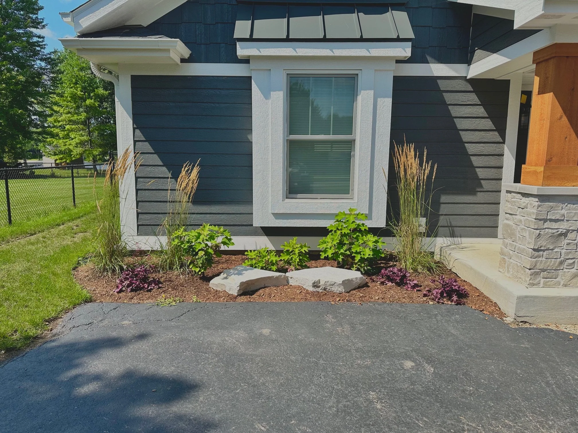 Perennial Planting Bed with Flagstone Centerpiece