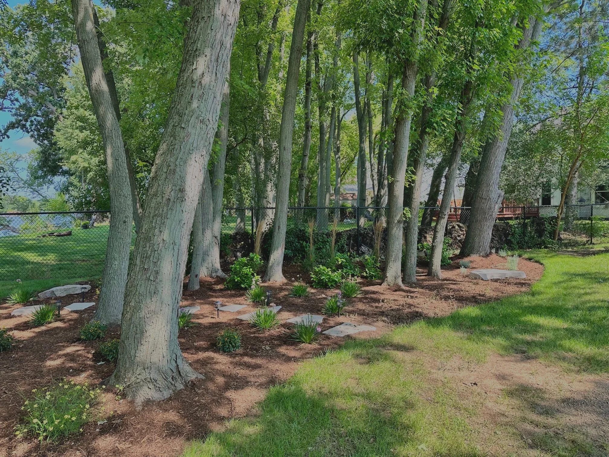 Perennial Planting Bed with Natural Flagstone Stepping Stone Pathway