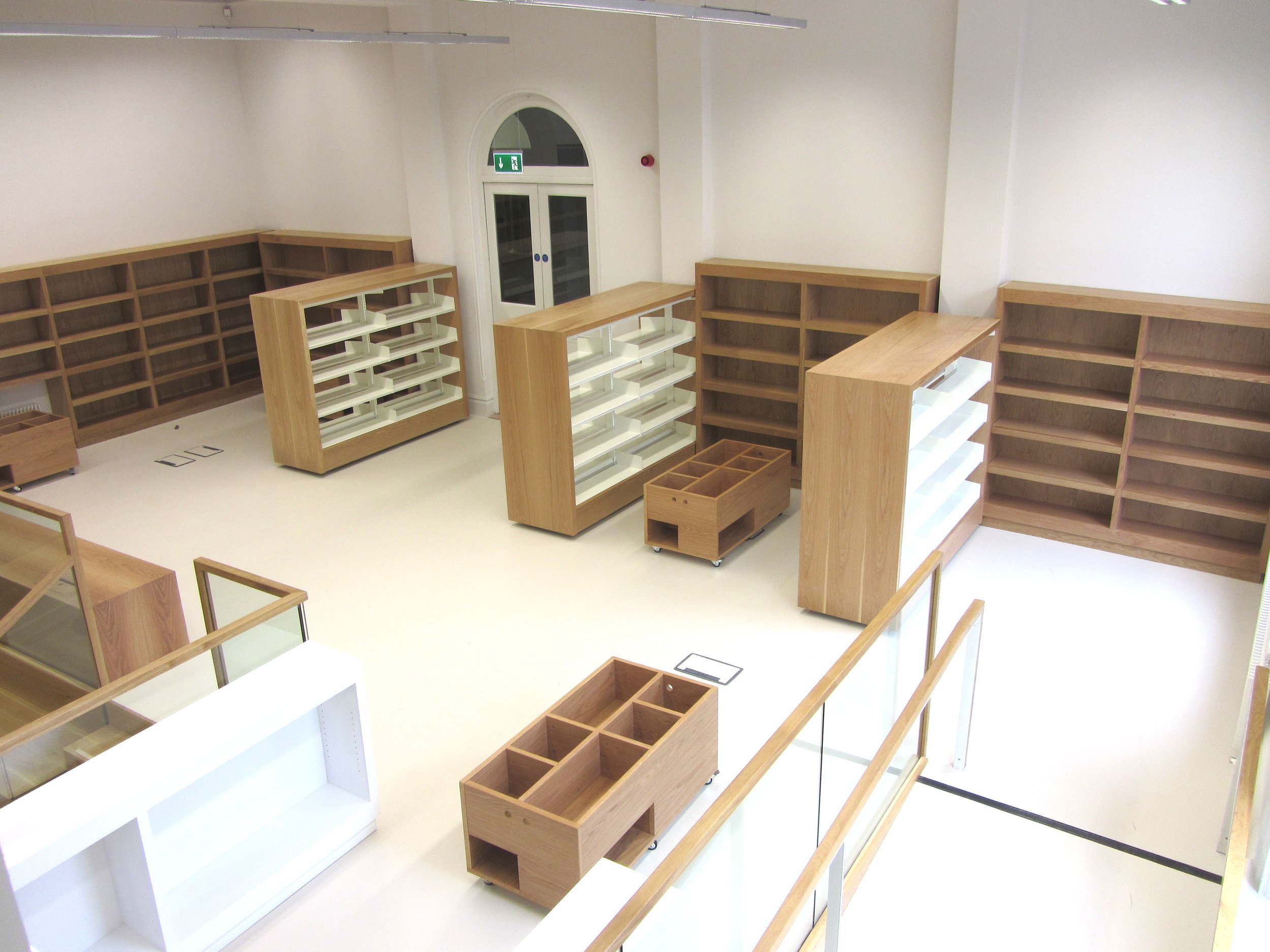 Custom design and fitted storage solutions for your workspace or library.