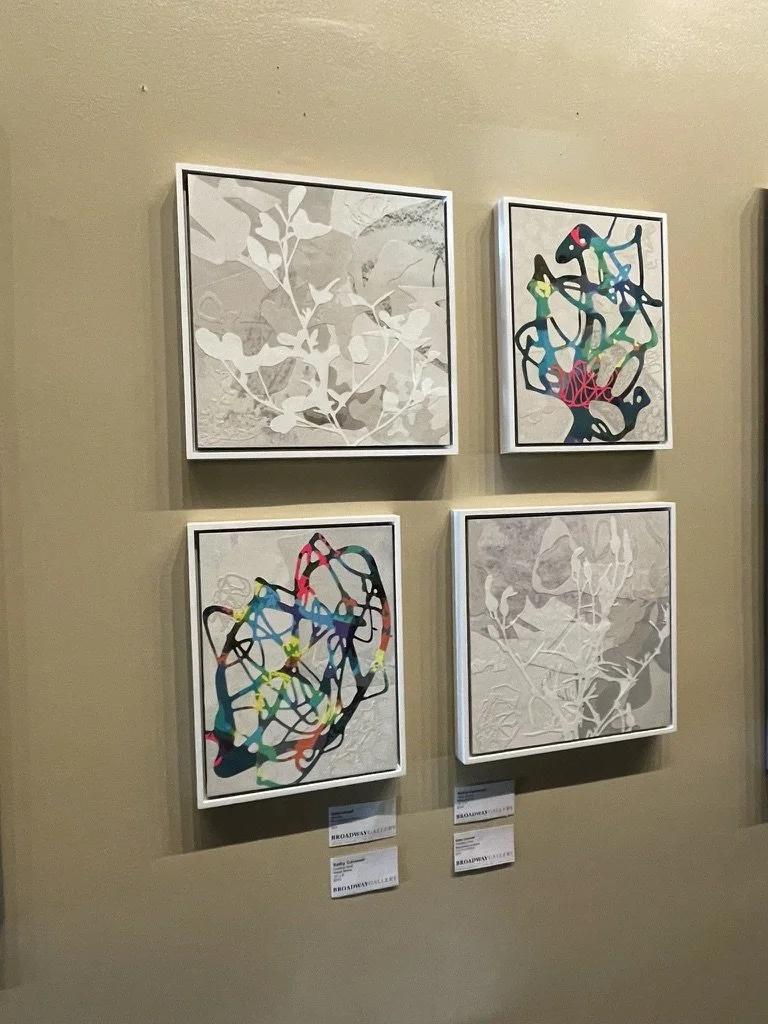 An arrangement of small colorful and neutral collages by Virginia-based artist Kathy Cornwell