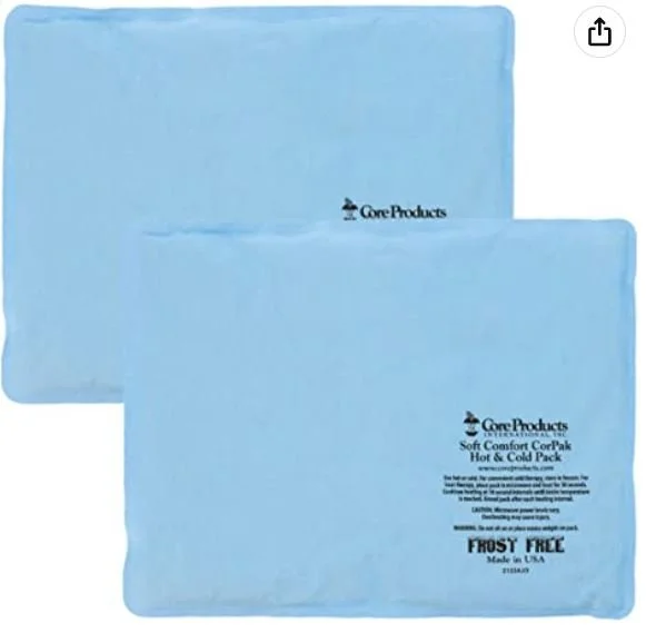 Two blue cold packs with One Products branding, labeled as soft comfort cold packs, frost free, made in the USA.