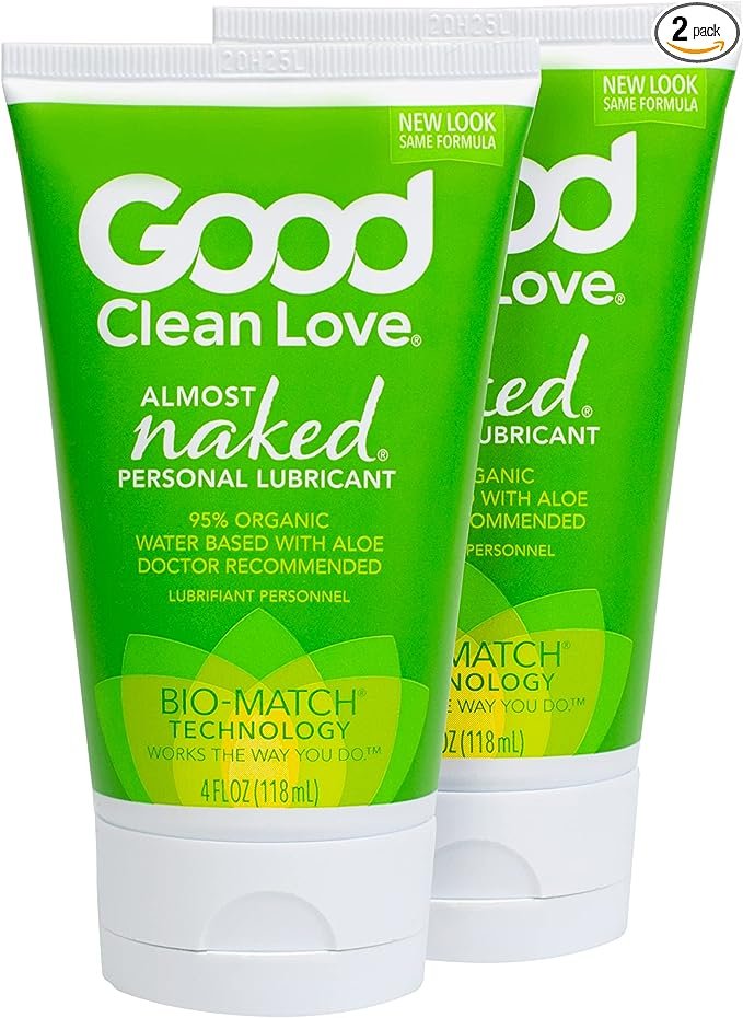 Two tubes of Good Clean Love Almost Naked personal lubricant, green packaging with white and yellow accents, indicating it is organic, water-based with aloe, and uses Bio-Match technology, each tube contains 4 fl oz (118 mL).