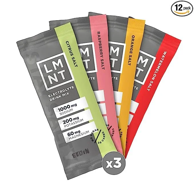 Variety pack of LMNT electrolyte drink mix packets in citrus salt, raspberry salt, orange salt, and watermelon salt flavors, with a label indicating 12 pack and 3 servings each.