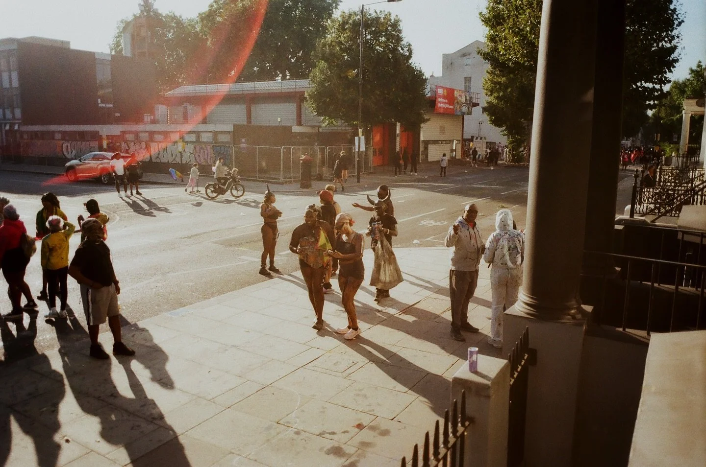8 am on Sunday. I arrive alone before the sound systems roar to life, capturing Carnival’s quiet transformation of ordinary London streets. It was taken from the early moments, revealing the sacred ordinary before streets become stages: the mor