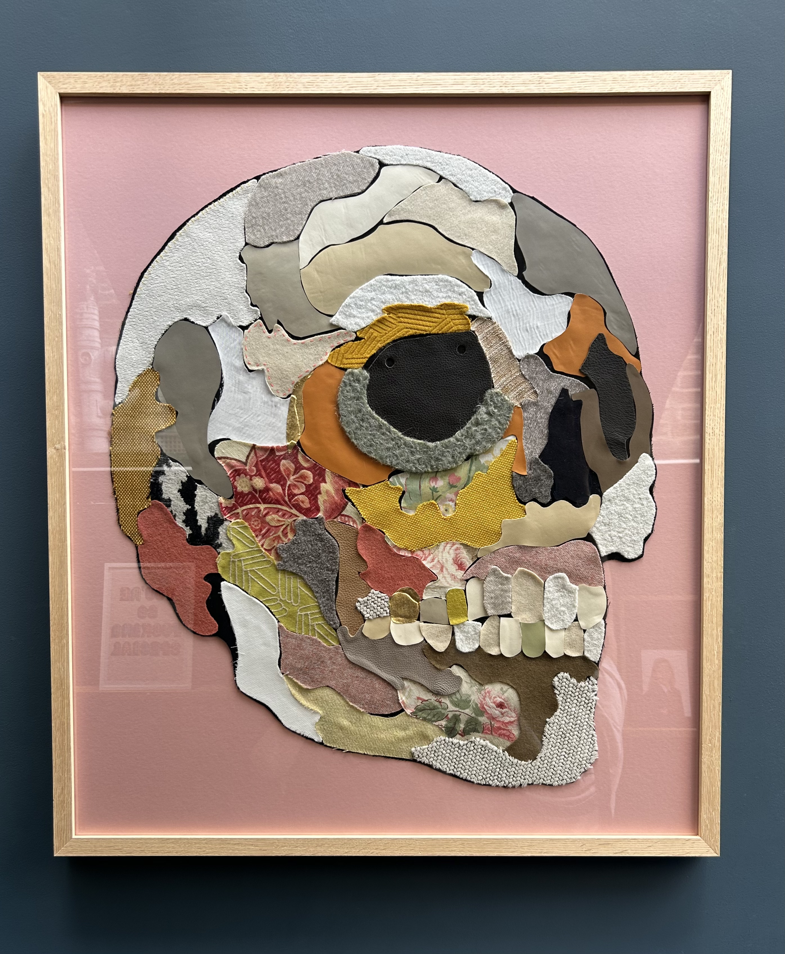 'Deadstock' 
2024
Recycled fabric, hand made collage, using off cuts from runway fashion week collections.  
Box framed with pink mount.