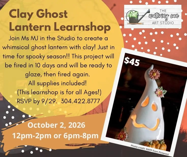 Image of a smiling ghost-shaped lantern made out of clay.