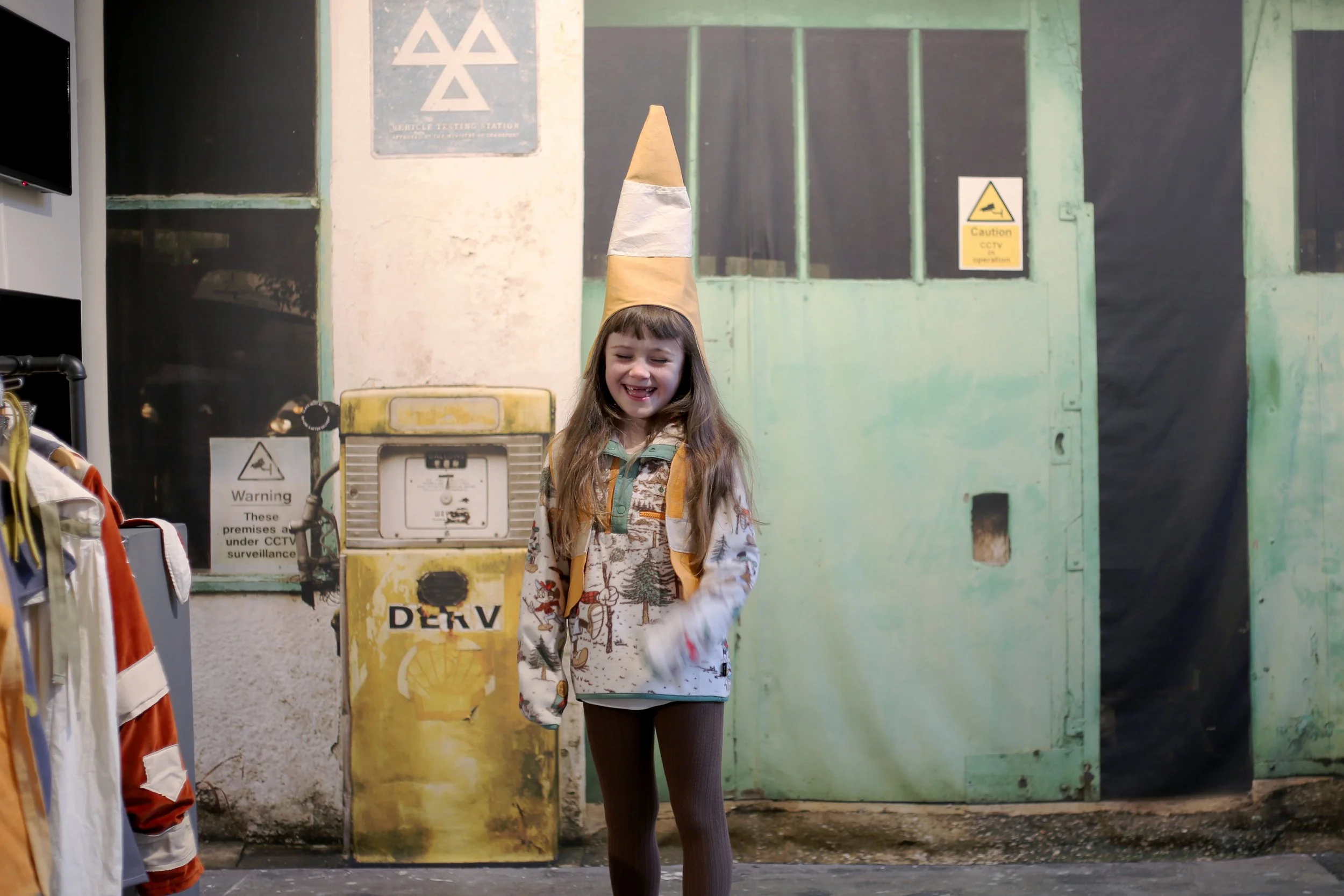 The Roadlore archive - dressing up rail and garage guise blessing backdrop. interactive element to be displayed alongside the fictional folklore exchange board