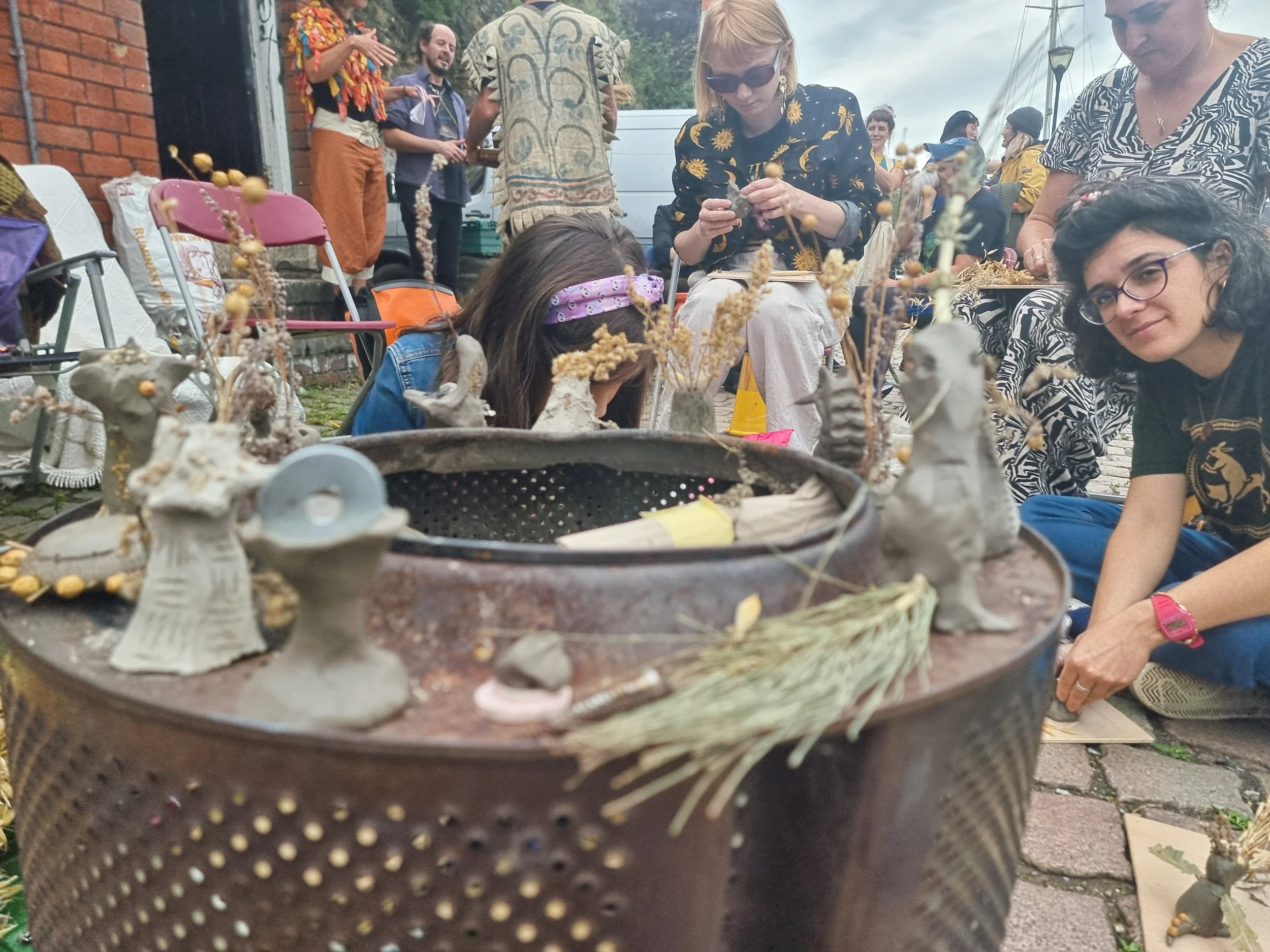Making clay charm at the Gleaner's Feast, Bristol 2024