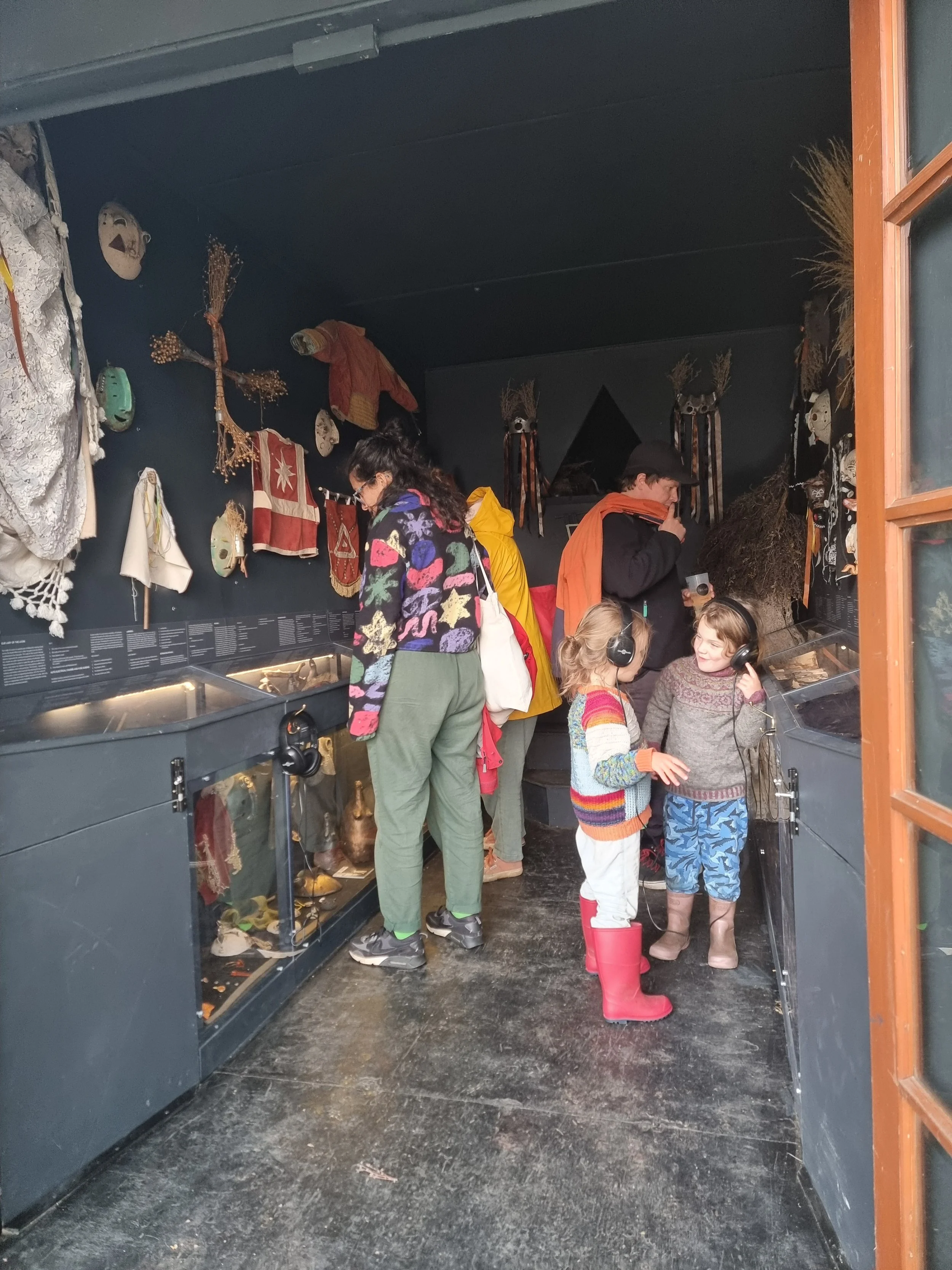 Visitors exploring the Museum of Roadside Magic at Priddy Folk fair 2024