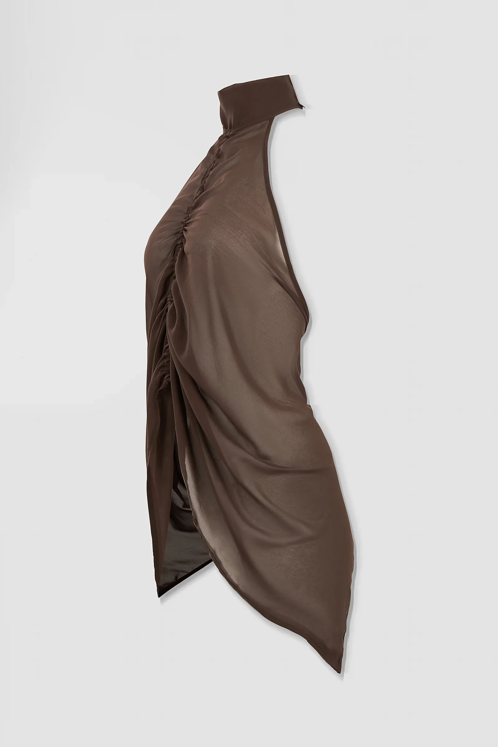 Side: Side view of the ‘Medusa’ brown chiffon halter top showing its open back, soft draping and elongated asymmetric silhouette.