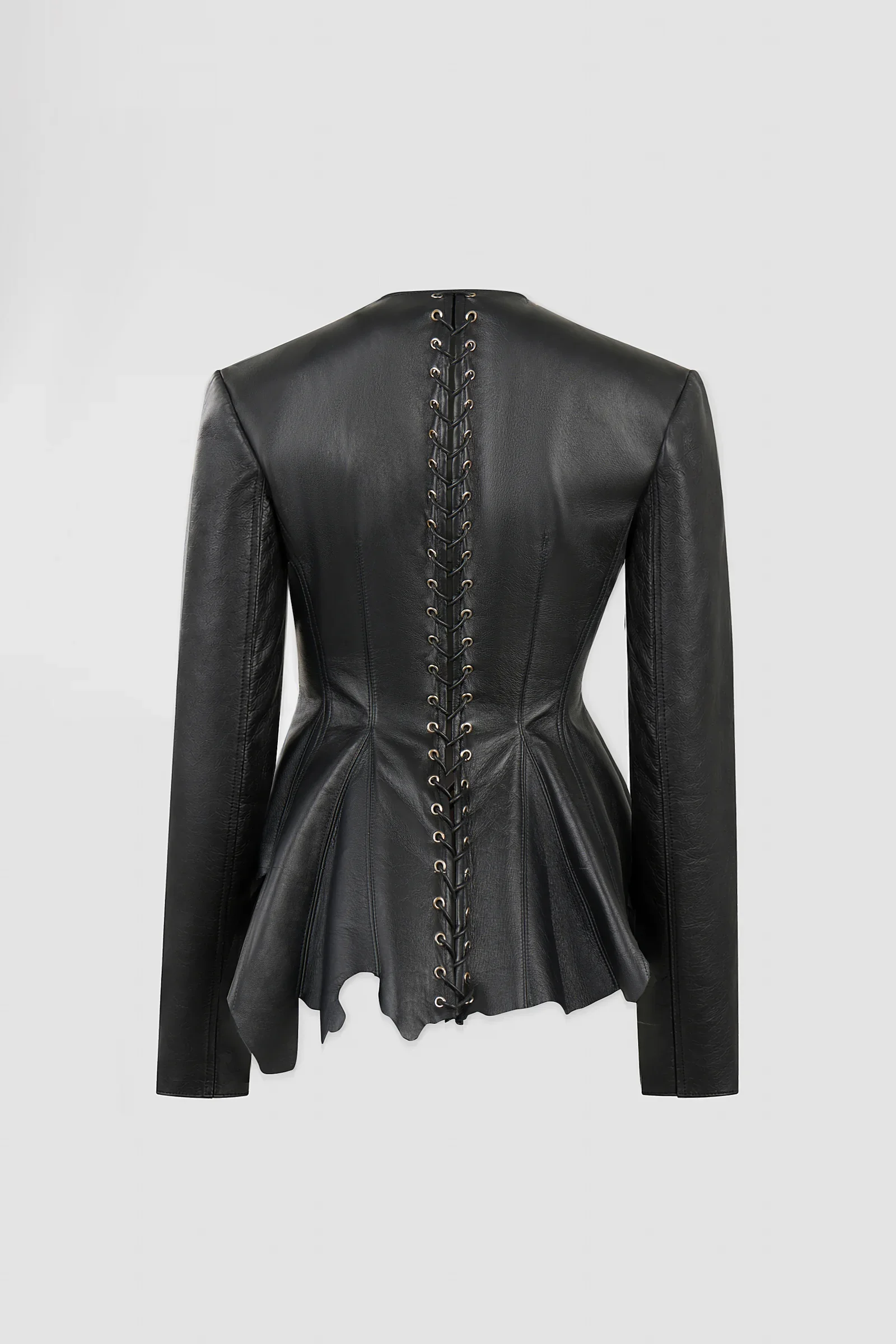 Back: Back view of ARAKHNE's ‘Euryale’ black leather jacket featuring full-length corset lacing, metal eyelets and an asymmetric raw-cut peplum.