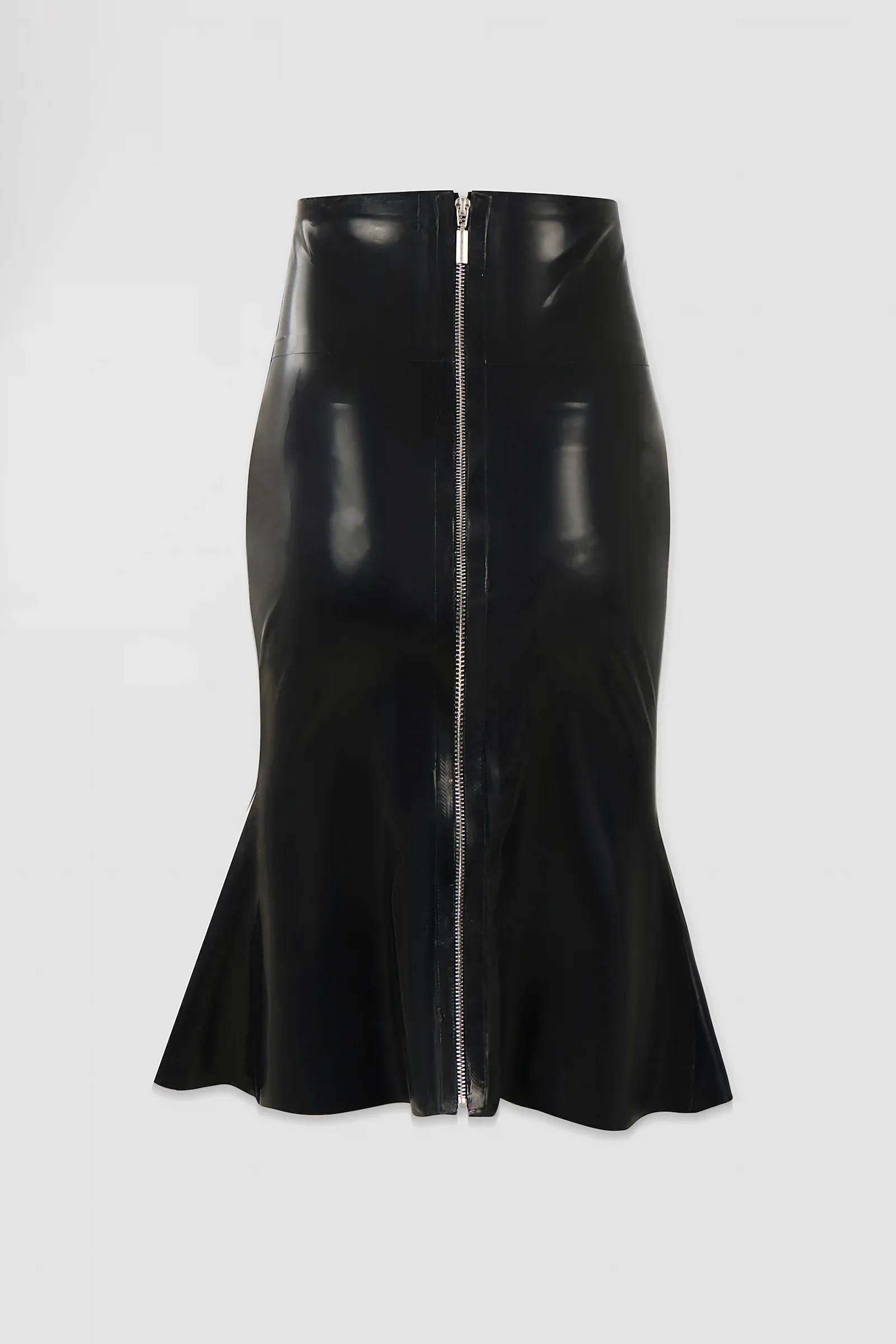 Side: Side view of the ‘Ophis’ latex skirt showing its body-contouring mermaid silhouette and flared lower panels.