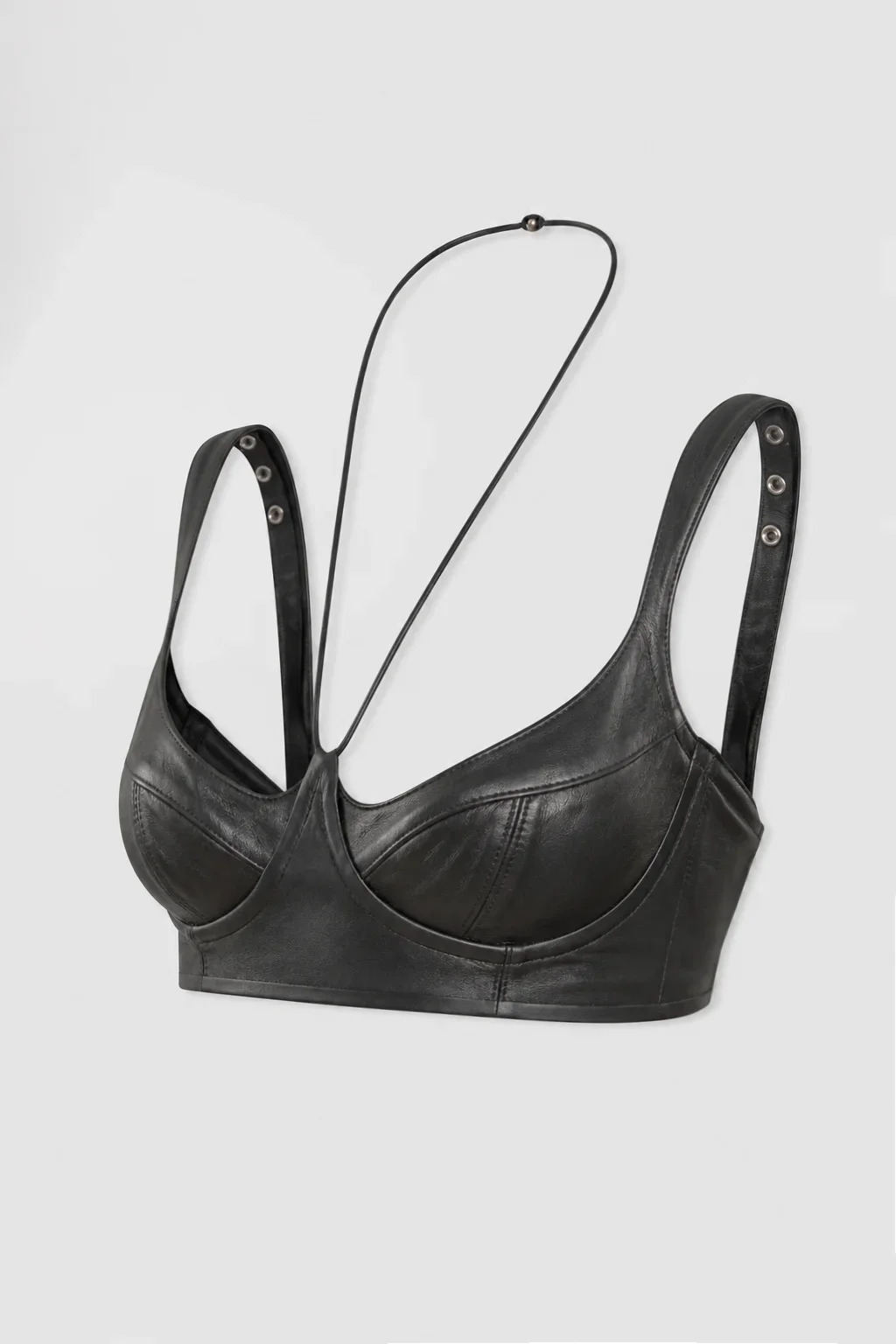 Three-quarter: Three-quarter view of the ‘Chira’ black bralette with clear view of the side seam and metal eyelets.