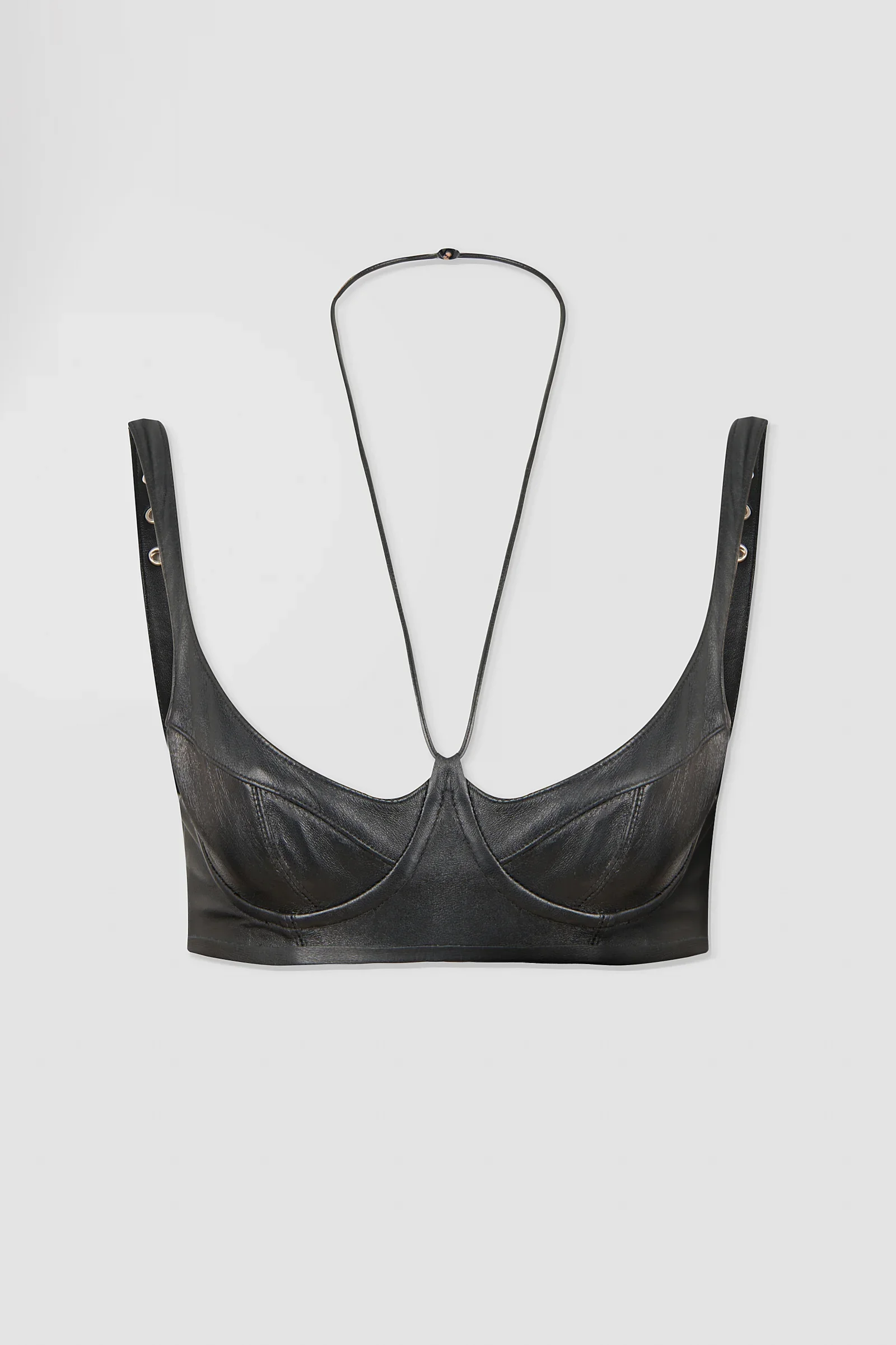 Front: Black Italian nappa leather bralette by ARAKHNE featuring sculpted cups, contoured seams, metal eyelet shoulder straps and a fine halterneck strap.