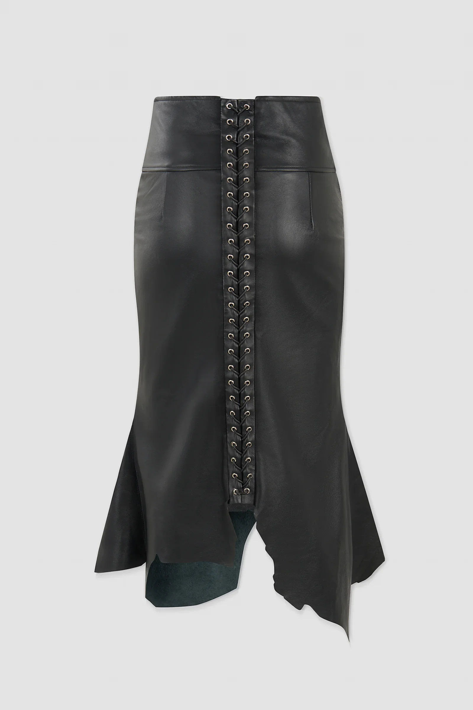 Back: Back view of ARAKHNE's ‘Euryale’ black leather midi skirt featuring full-length corset-style lacing, metal eyelets and an asymmetric flared hem.