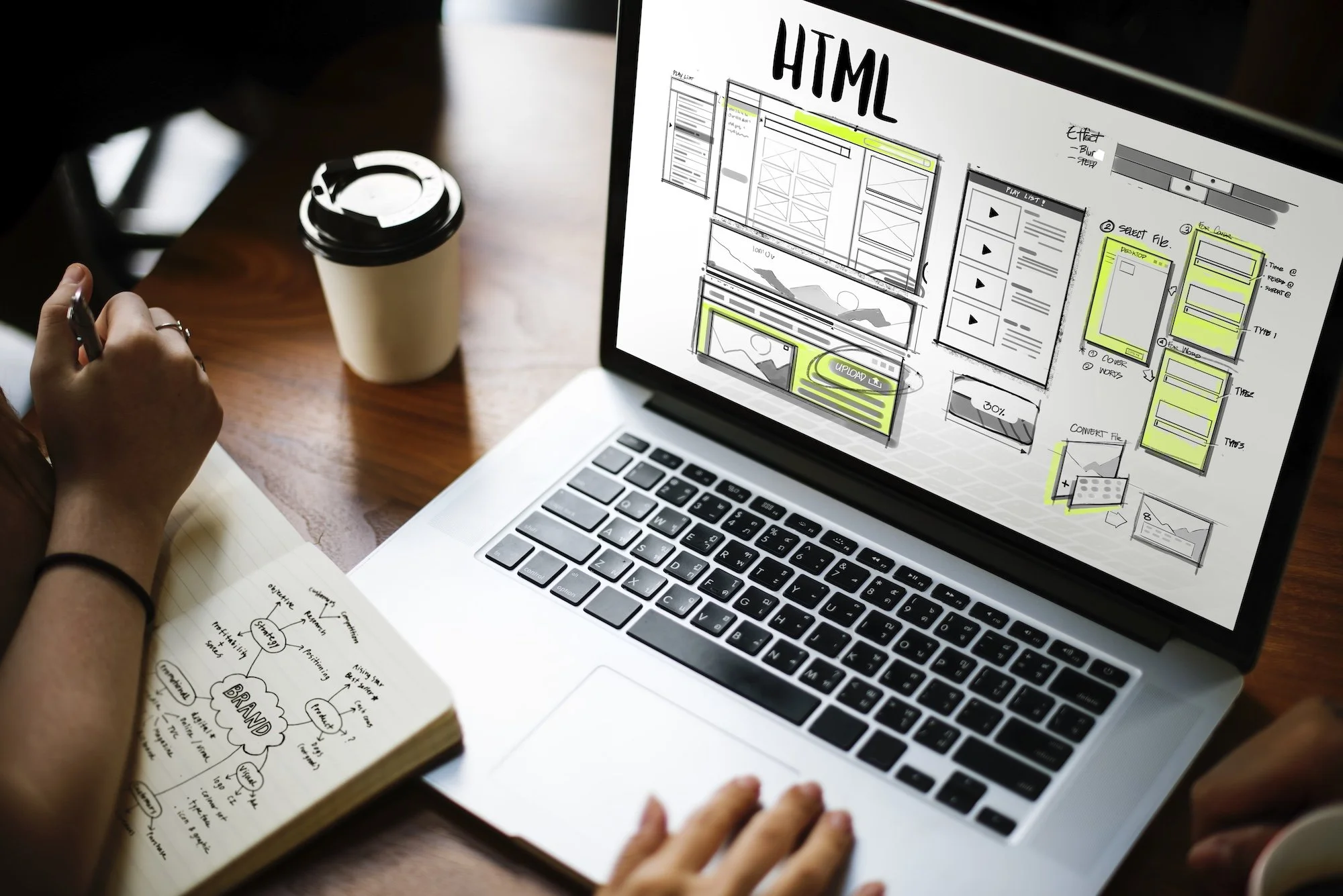 A laptop that is being used to design a website.