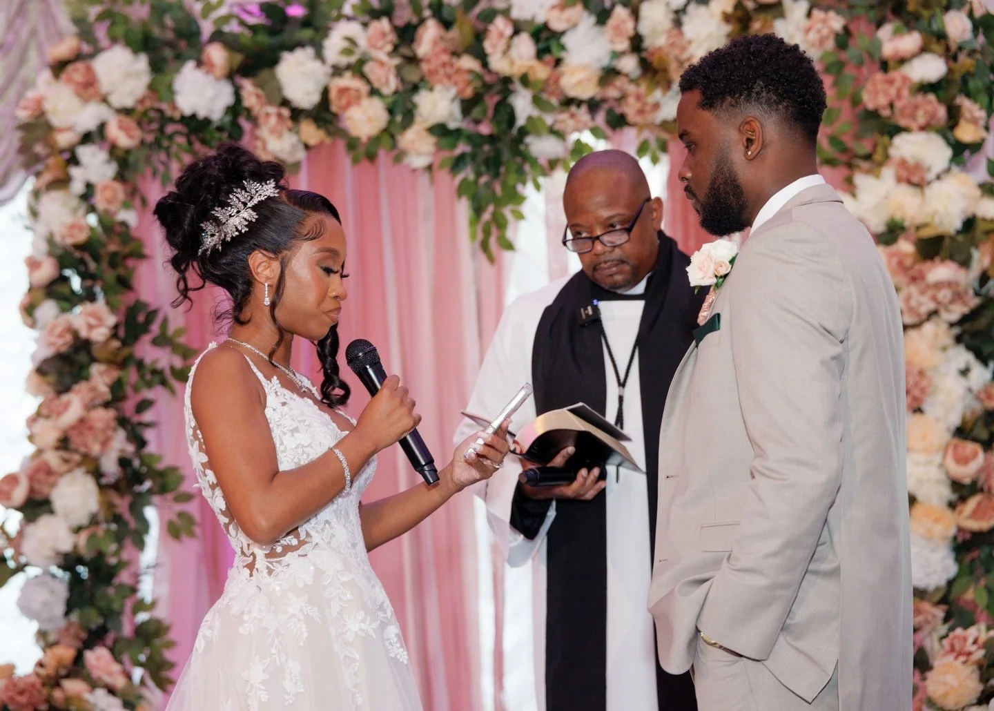 One year ago today, Neco &amp; Dejeun&eacute;e said &lsquo;I do&rsquo; surrounded by love, elegance, and unwavering faith. What began as plans for an outdoor ceremony quickly turned into a beautiful reminder that even when the rain falls, true love s
