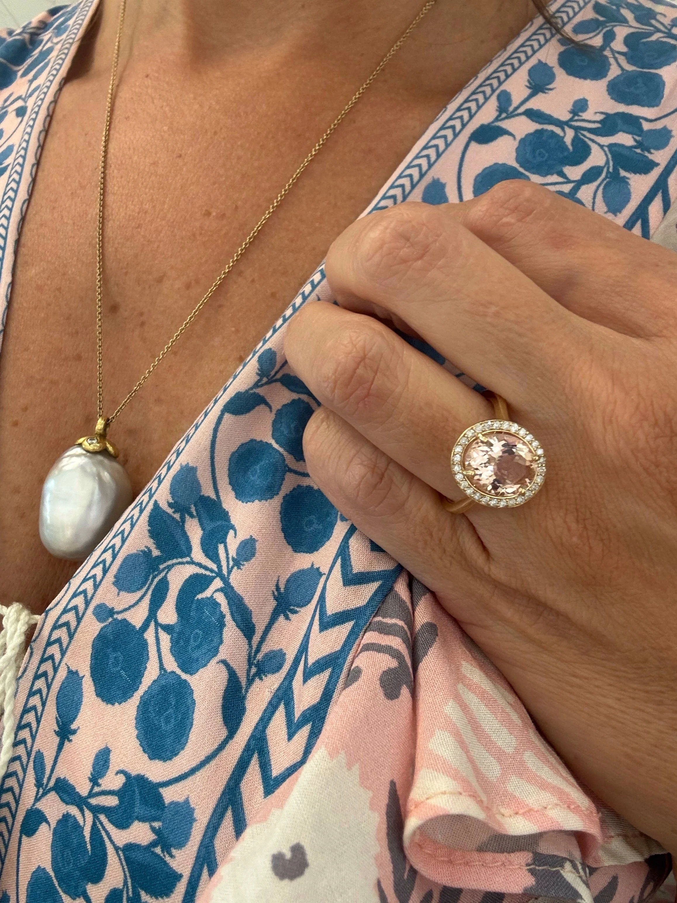 Gold ring with a morganite gemstone and diamond accents at The Aspen Hive in Aspen