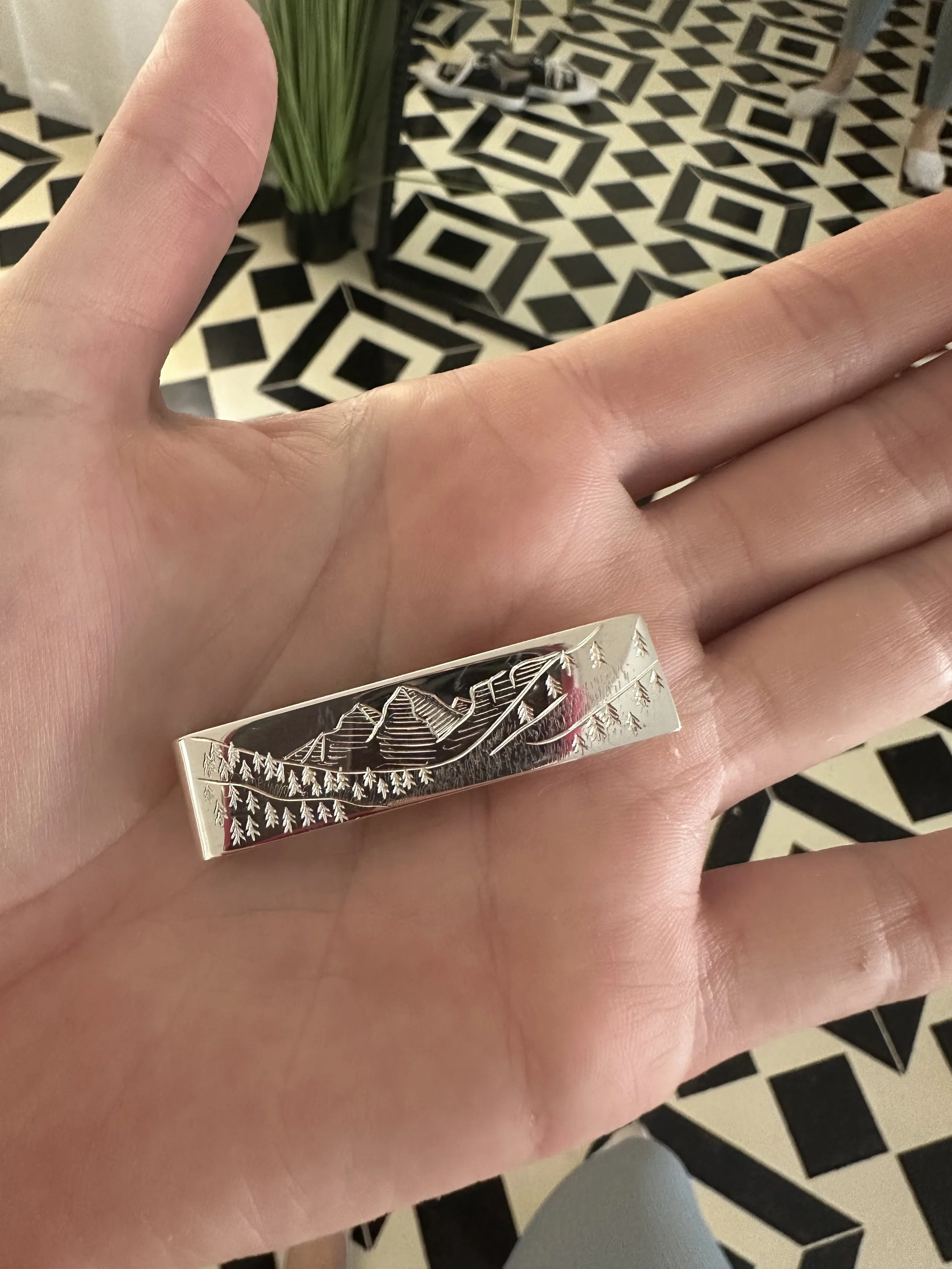 Silver engraved money clip with Maroon Bells engraved at The Aspen Hive