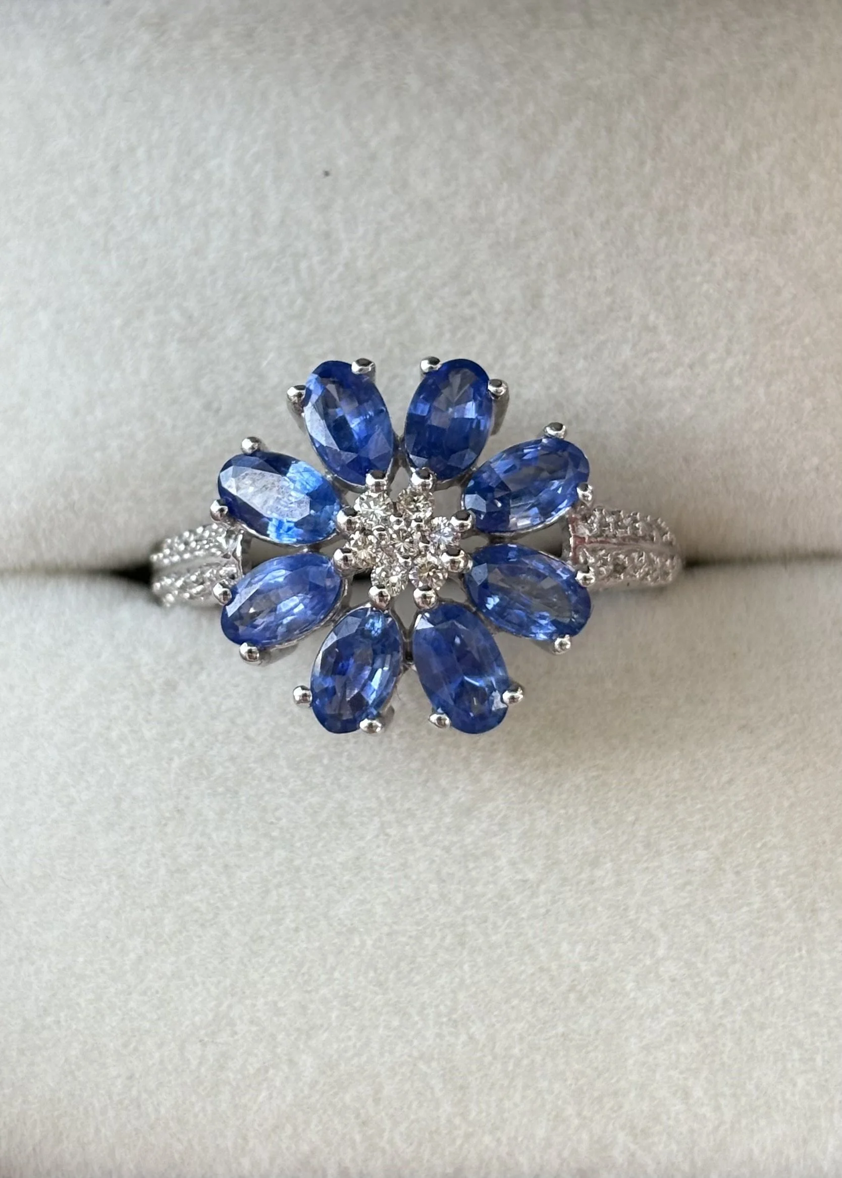Blue sapphire floral ring with diamond accents at The Aspen Hive in Aspen, Colorado