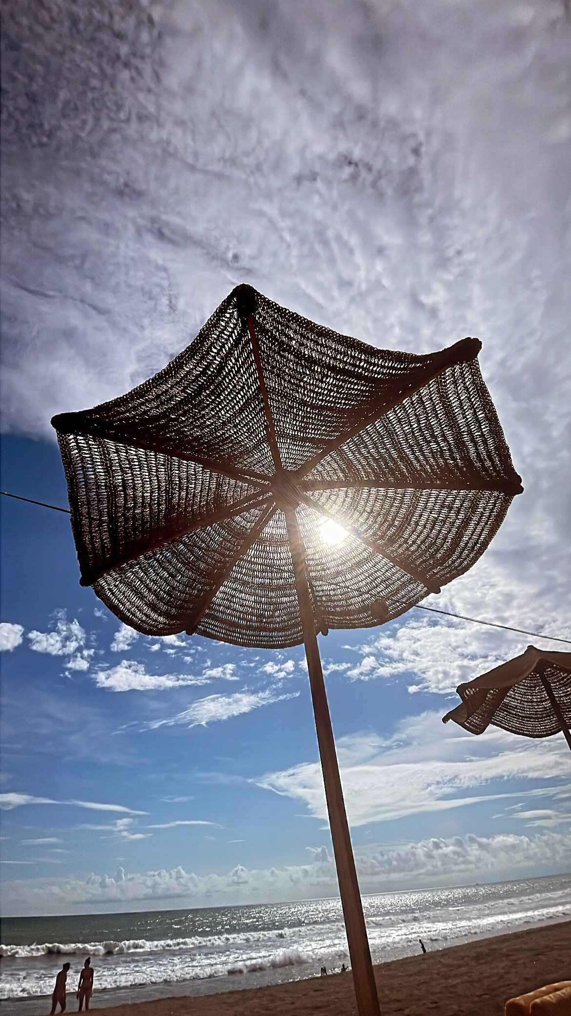 who doesn't love a cute woven umbrella?!
