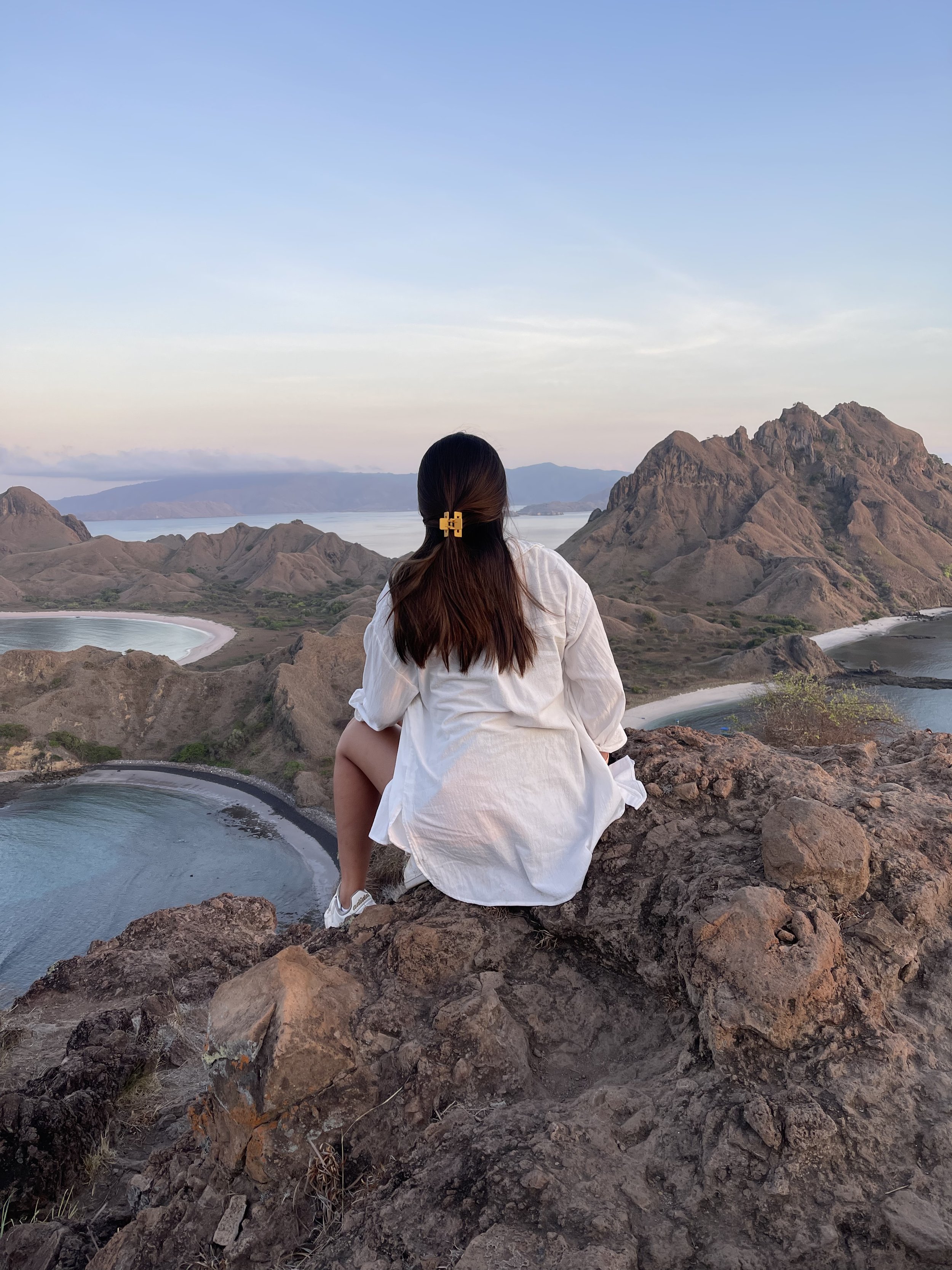 feeling like the queen of the world sitting on top of this rock rn