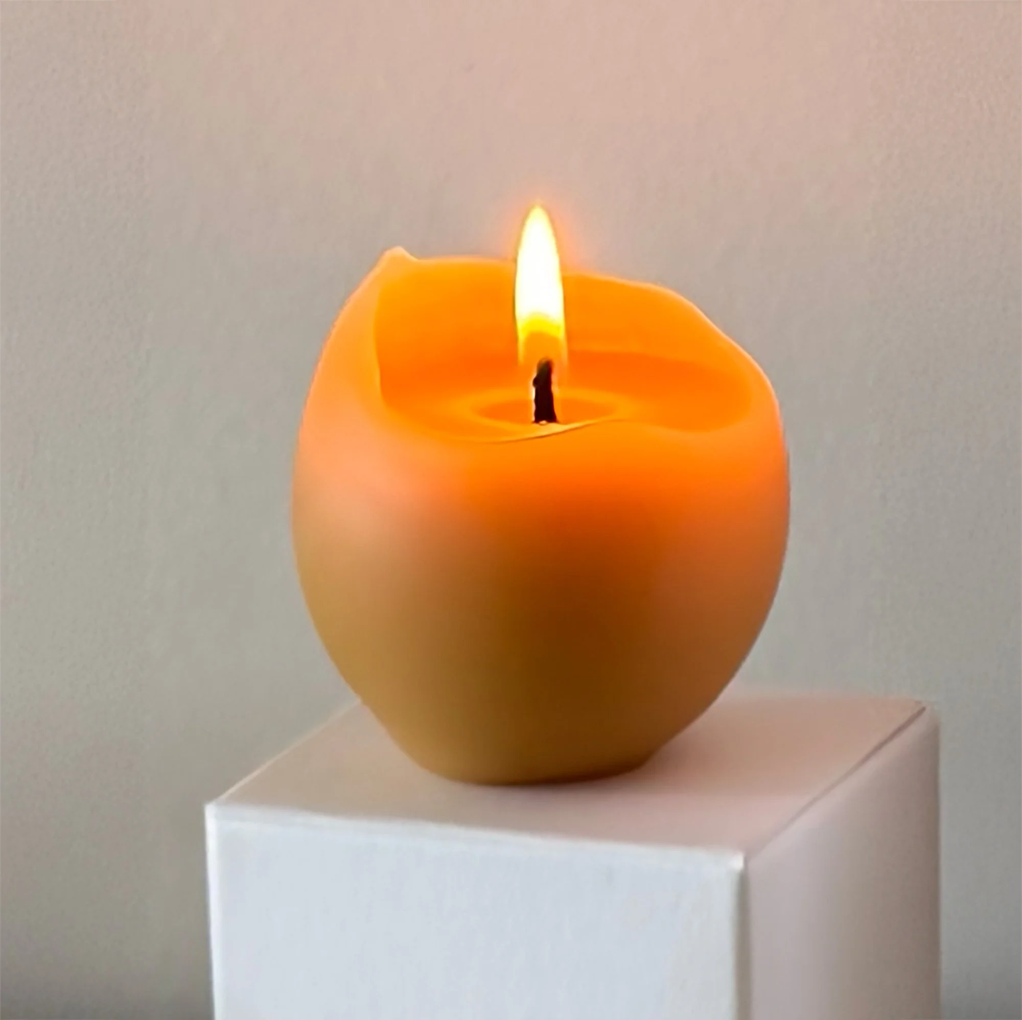 beeswax-candle-egg-lit.jpg