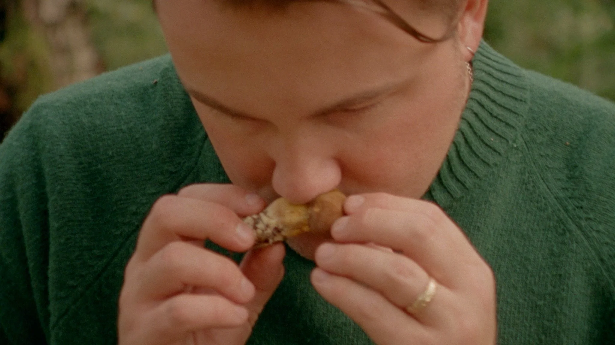 A close, observational moment of Tomos Parry foraging wild mushrooms in Snowdonia captured as part of a food-led documentary process.