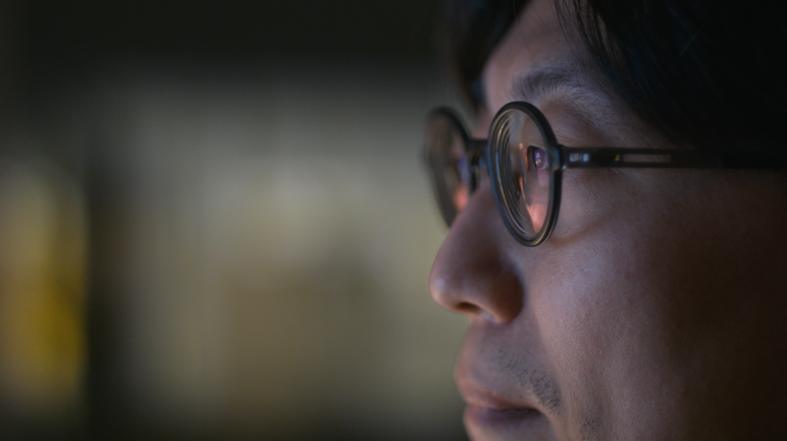 Portrait of an engineer reviewing digital design work, filmed as part of a branded architectural documentary exploring engineering and innovation.