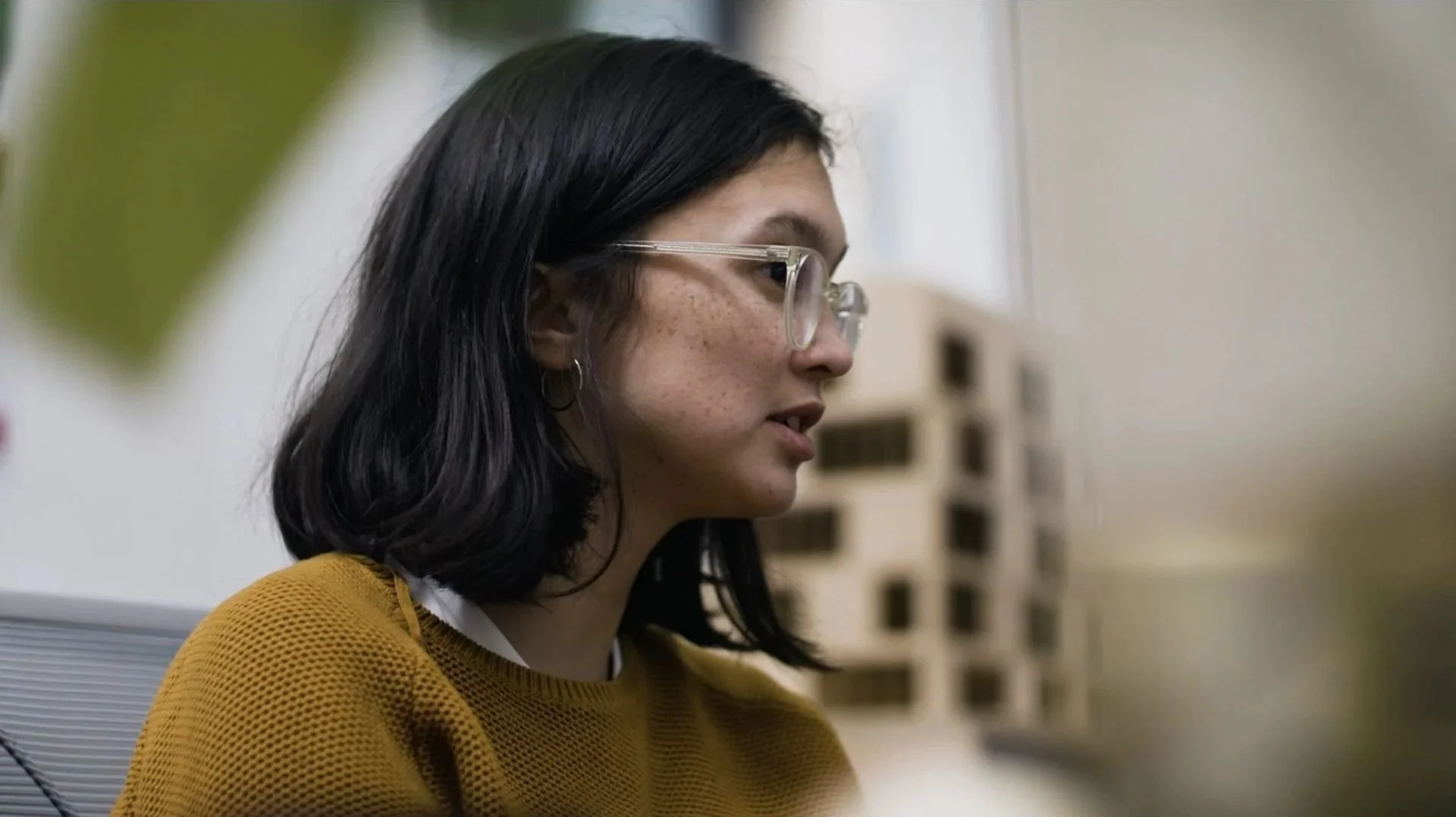 Hawkins/Brown architect interviewed in studio female designer with architectural model, Thames Tideway Pocket Parks film by James Dougan