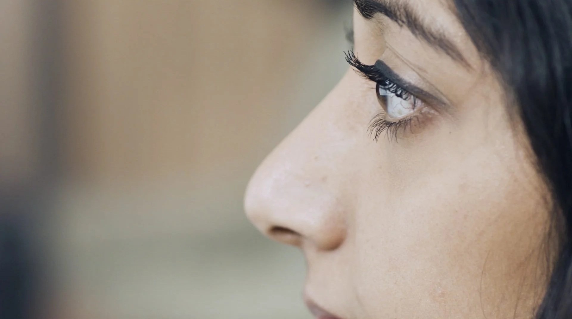 Thames Tideway architecture film — extreme close-up cinematic portrait of
female interview subject, creative director James Dougan, London