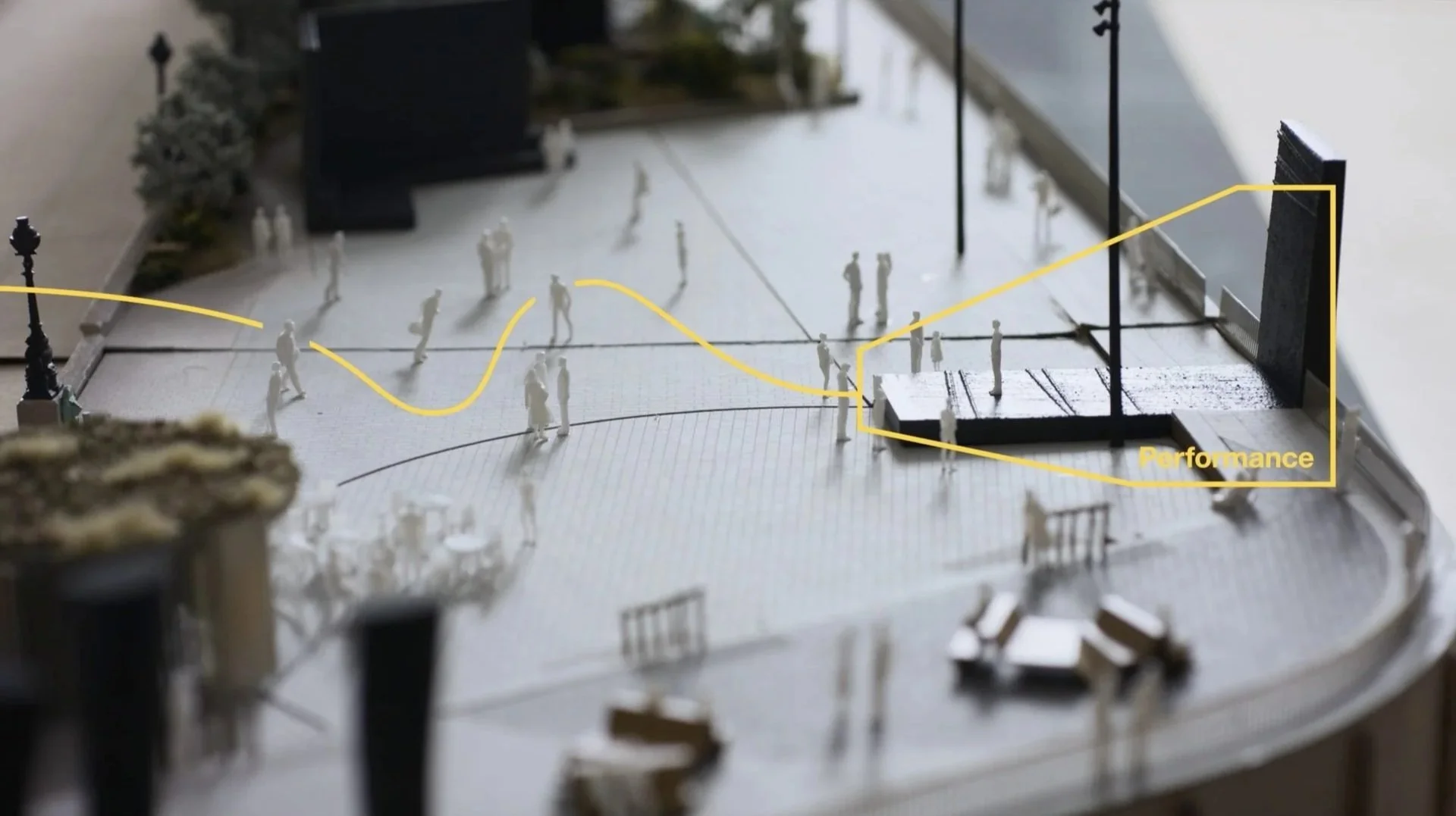 Victoria Embankment Tideway design — white architectural scale model with
yellow graphic performance space annotation, Hawkins/Brown architecture
film