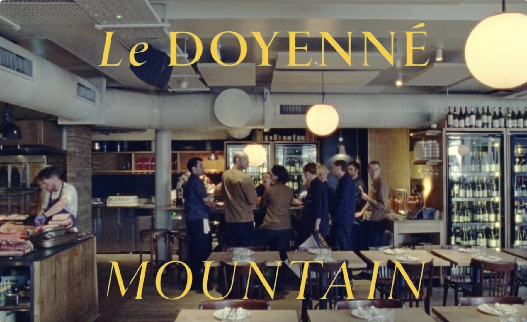 Mountain restaurant Soho interior during Le Doyenné collaboration event, globe
pendant lights, open kitchen, filmed by James Dougan